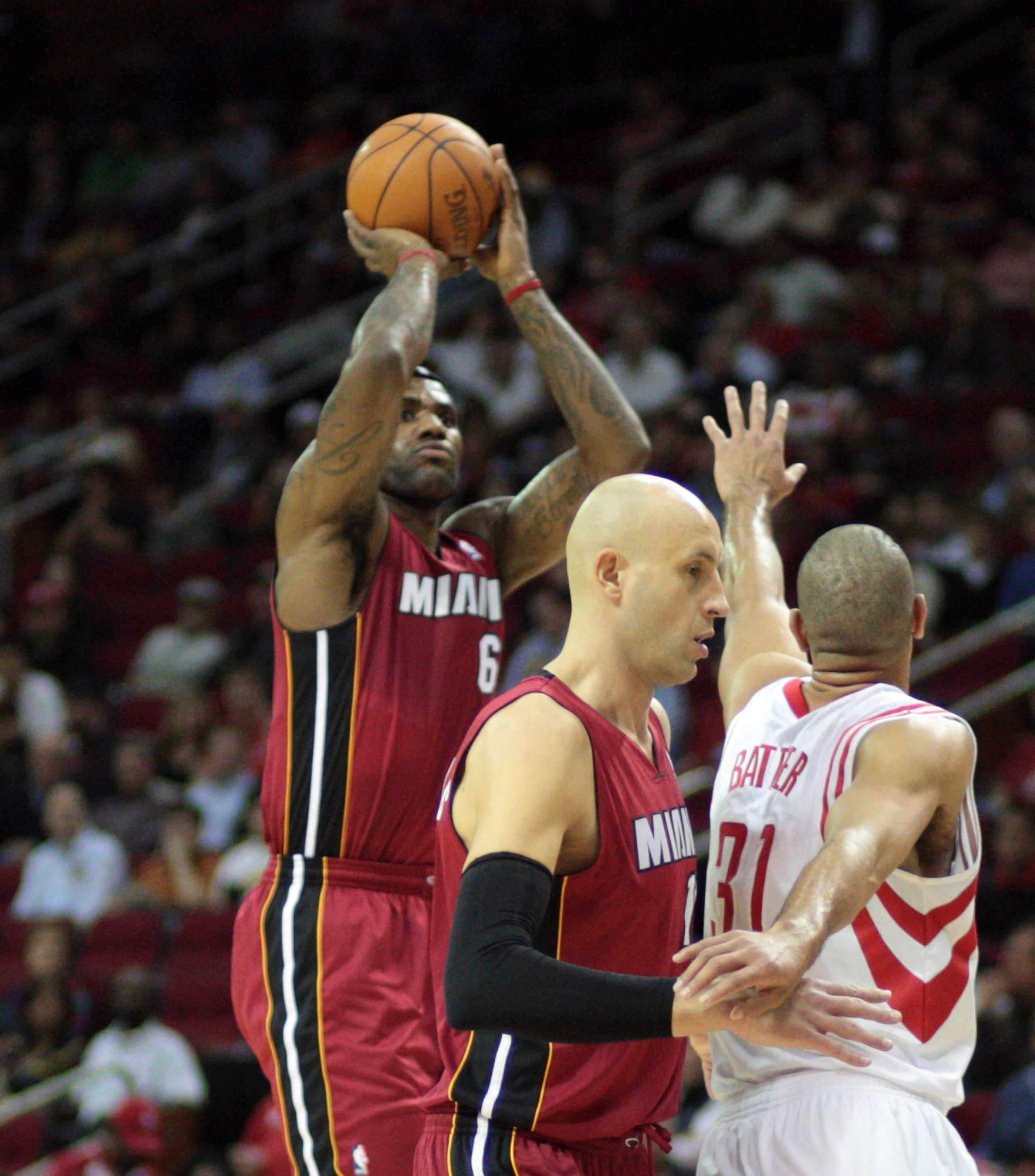 HOUSTON - DECEMBER 29:  LeBron James #6 of the Miami Heat shoots a jumper over Shane Battier #31 of the Houston Rockets in the first half at Toyota Center on December 29, 2010 in Houston, Texas.  NOTE TO USER: User expressly acknowledges and agrees that,
