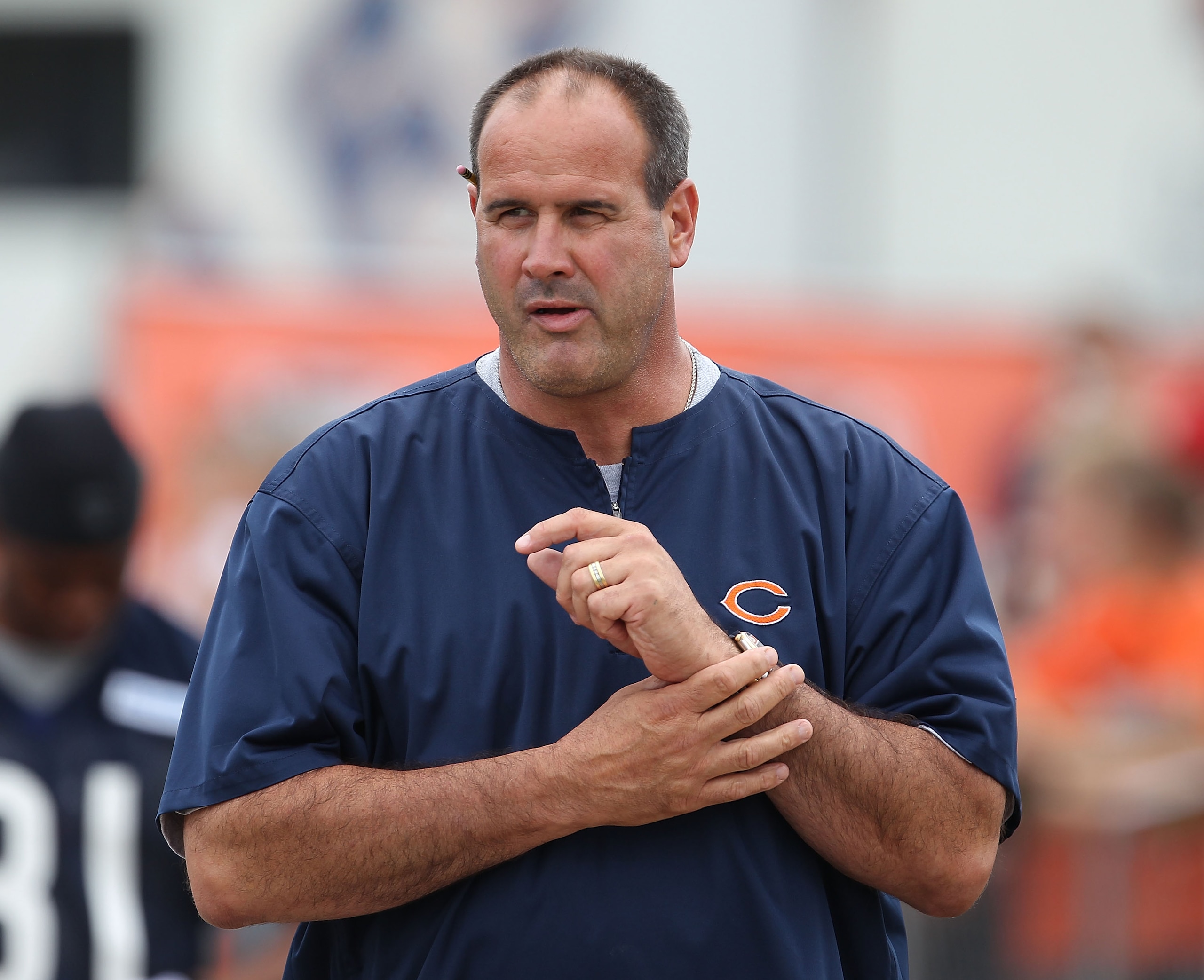 BOURBONNAIS, IL - JULY 30: Offensive line coach Mike Tice of the Chicago Bears walks out for a summer training camp practice at Olivet Nazarene University on July 30, 2010 in Bourbonnais, Illinois. (Photo by Jonathan Daniel/Getty Images)