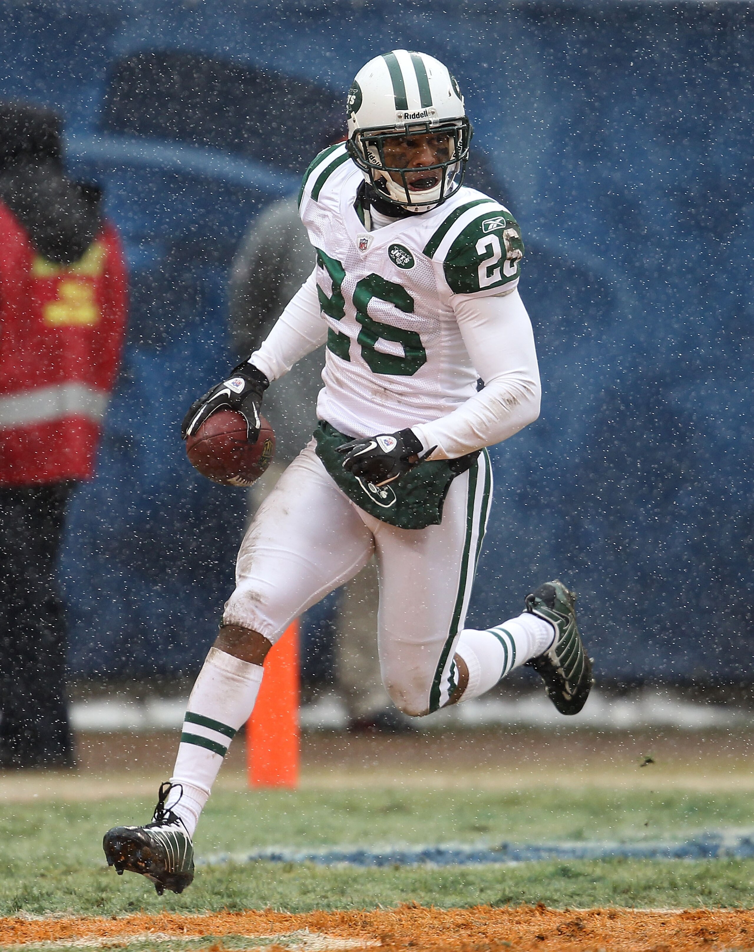 CHICAGO, IL - DECEMBER 26: Dwight Lowery #26 of the New York Jets runs across the end zone after interceptiong a pass for a touchdown against the Chicago Bearsat Soldier Field on December 26, 2010 in Chicago, Illinois. The Bears defeated the Jets 38-34. (