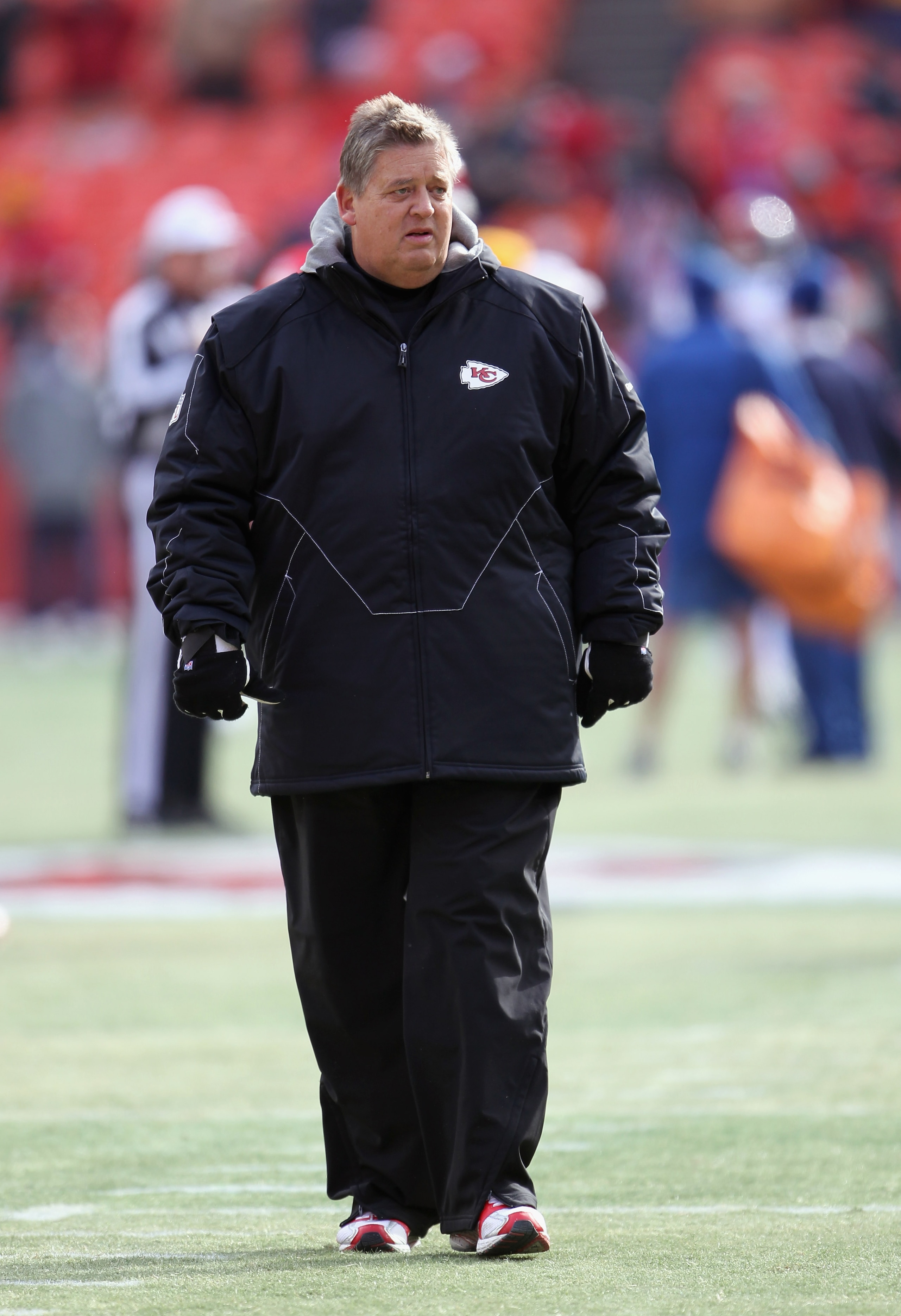 KANSAS CITY, MO - DECEMBER 05:  Offensive coordinator Charlie Weis of the Kansas City Chiefs walks on the field prior to the game against the Denver Broncos on December 5, 2010 at Arrowhead Stadium in Kansas City, Missouri.  (Photo by Jamie Squire/Getty I