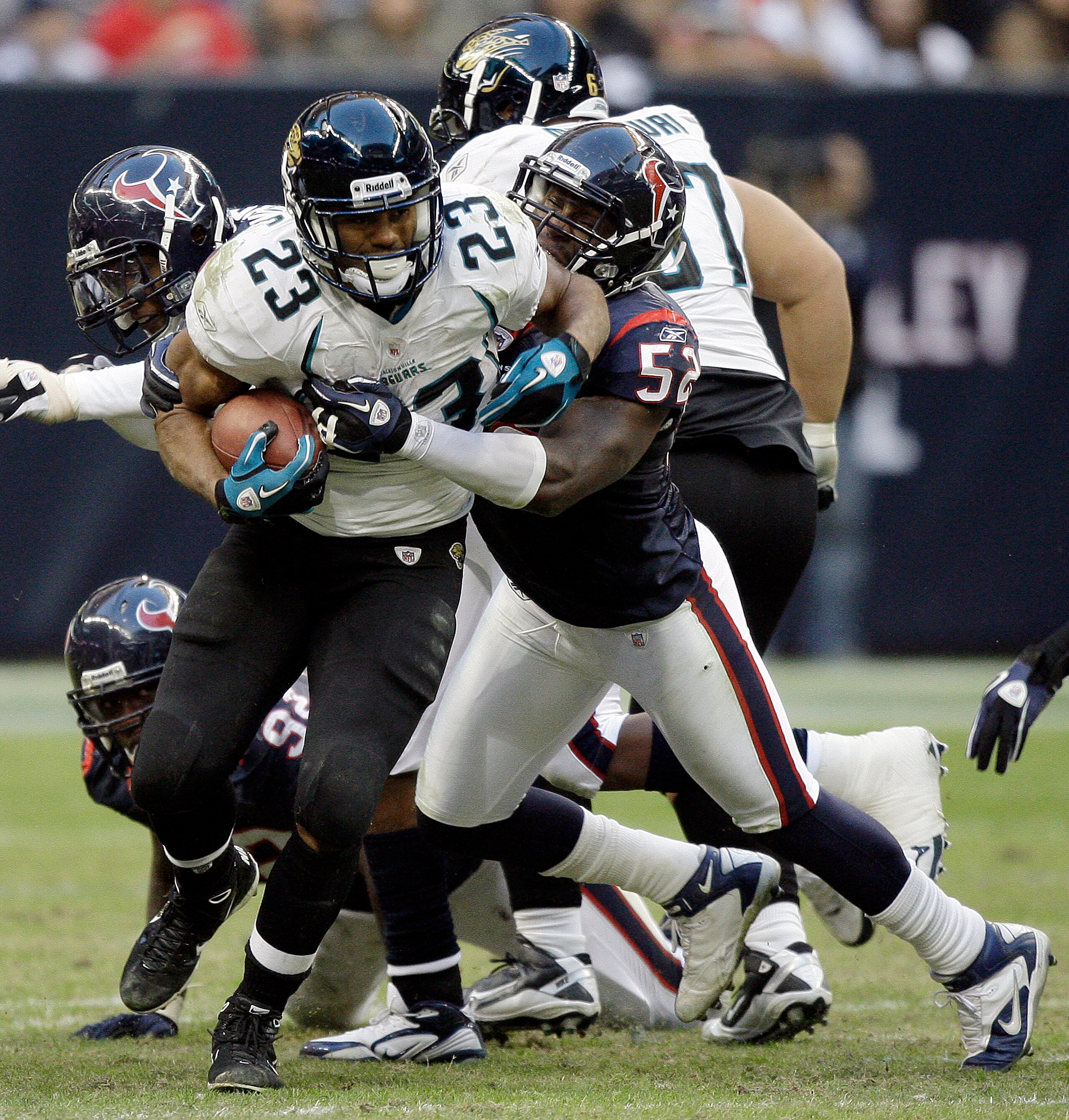HOUSTON - JANUARY 02: Running back Rashad Jennings #23 of the Jacksonville Jaguars is tackled by Xavier Adibi #52 of the Houston Texans at Reliant Stadium on January 2, 2011 in Houston, Texas. (Photo by Bob Levey/Getty Images) HOUSTON - JANUARY 02: Running back Rashad Jennings #23 of the Jacksonville Jaguars is tackled by Xavier Adibi #52 of the Houston Texans at Reliant Stadium on January 2, 2011 in Houston, Texas. (Photo by Bob Levey/Getty Images)