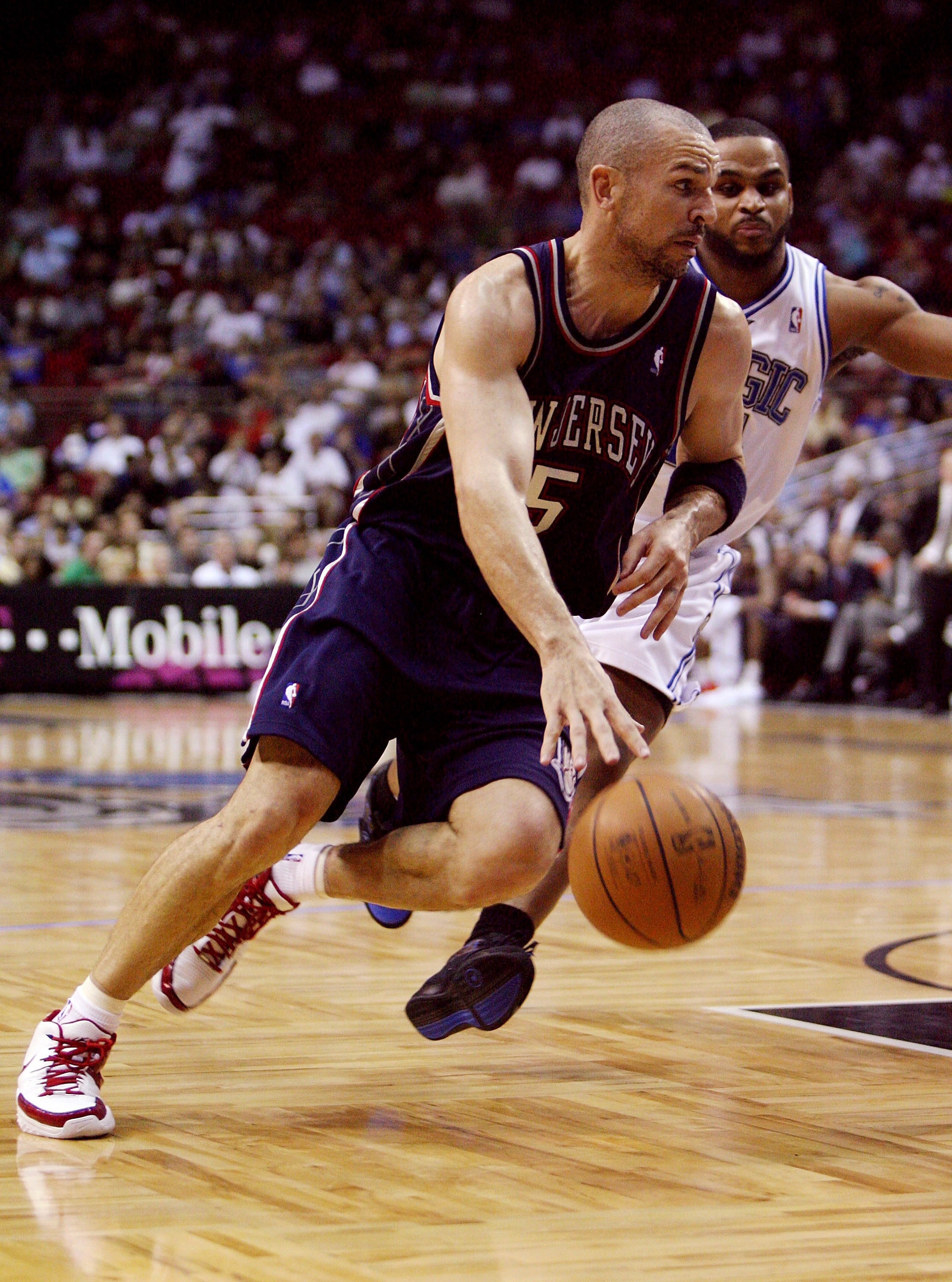 ORLANDO, FL - FEBRUARY 06: Jason Kidd #5 of the New Jersey Nets drives past Jameer Nelson #14 of the Orlando Magic at Amway Arena on February 6, 2008 in Orlando, Florida. NOTE TO USER: User expressly acknowledges and agrees that, by downloading and or us ORLANDO, FL - FEBRUARY 06: Jason Kidd #5 of the New Jersey Nets drives past Jameer Nelson #14 of the Orlando Magic at Amway Arena on February 6, 2008 in Orlando, Florida. NOTE TO USER: User expressly acknowledges and agrees that, by downloading and or us