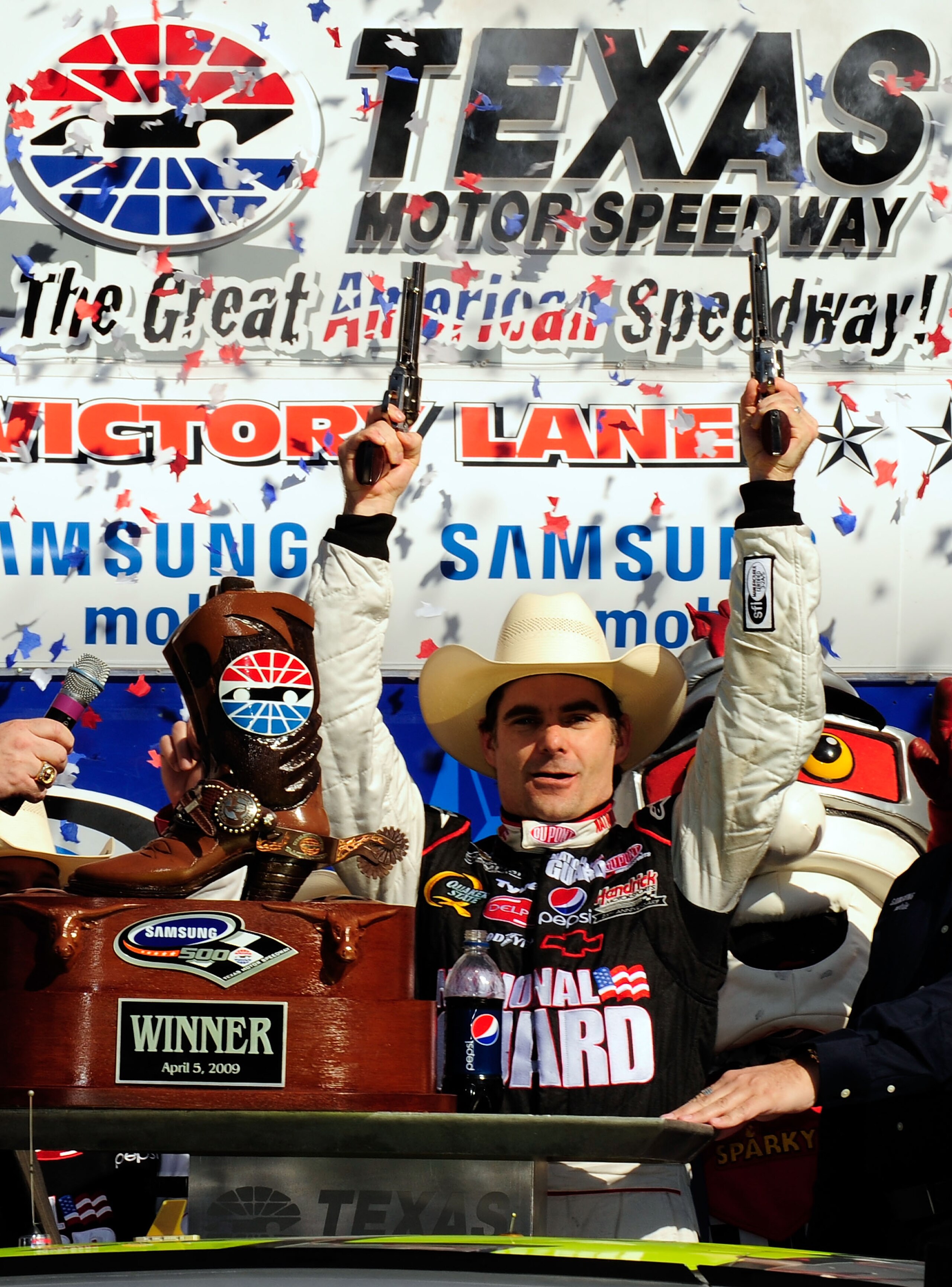 FORT WORTH, TX - APRIL 05: Jeff Gordon, driver of the #24 DuPont Chevrolet, celebrates in victory lane after winning the NASCAR Sprint Cup Series Samsung 500 at Texas Motor Speedway on April 5, 2009 in Fort Worth, Texas. (Photo by Rusty Jarrett/Getty Im FORT WORTH, TX - APRIL 05: Jeff Gordon, driver of the #24 DuPont Chevrolet, celebrates in victory lane after winning the NASCAR Sprint Cup Series Samsung 500 at Texas Motor Speedway on April 5, 2009 in Fort Worth, Texas. (Photo by Rusty Jarrett/Getty Im