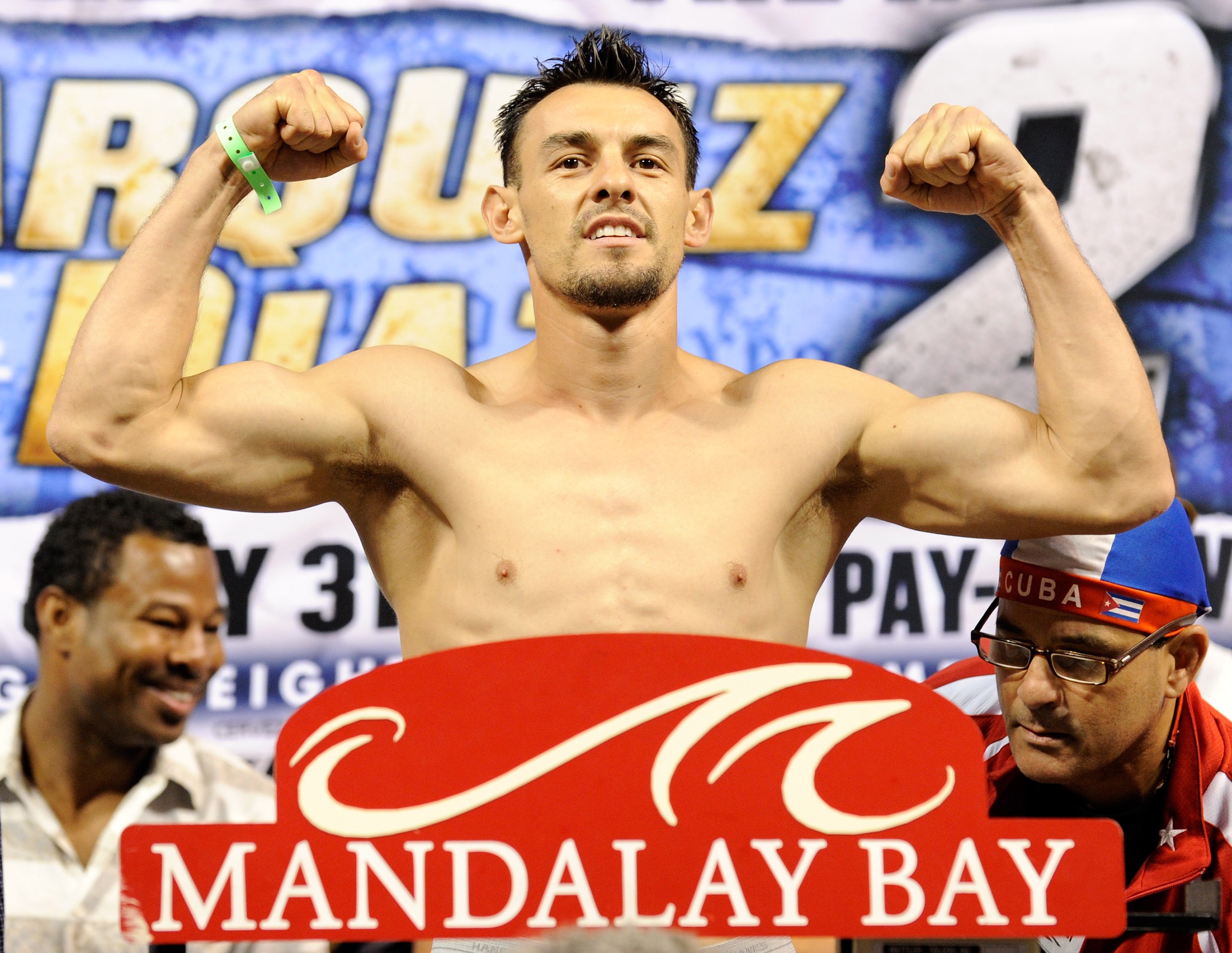LAS VEGAS - JULY 30:  Robert Guerrero poses on the scale during the official weigh-in for his junior welterweight fight against Joel Casamayor at the Mandalay Bay Events Center July 30, 2010 in Las Vegas, Nevada.  (Photo by Ethan Miller/Getty Images)
