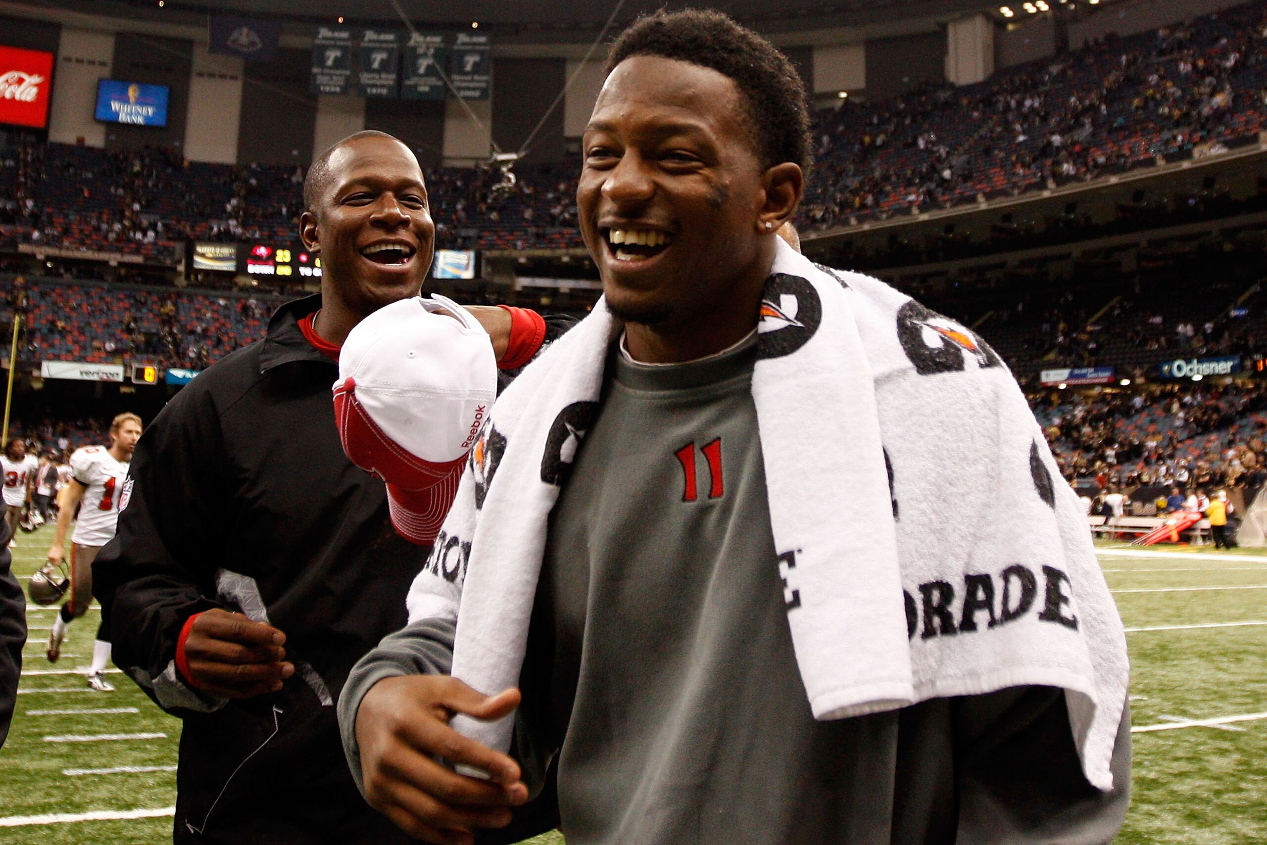 NEW ORLEANS, LA - JANUARY 02: Head coach Raheem Morris celebrates with Elbert Mack #33 of the Tampa Bay Buccaneers after defeating the New Orleans Saints 23-13 at the Louisiana Superdome on January 2, 2011 in New Orleans, Louisiana. (Photo by Chris Grayt NEW ORLEANS, LA - JANUARY 02: Head coach Raheem Morris celebrates with Elbert Mack #33 of the Tampa Bay Buccaneers after defeating the New Orleans Saints 23-13 at the Louisiana Superdome on January 2, 2011 in New Orleans, Louisiana. (Photo by Chris Grayt