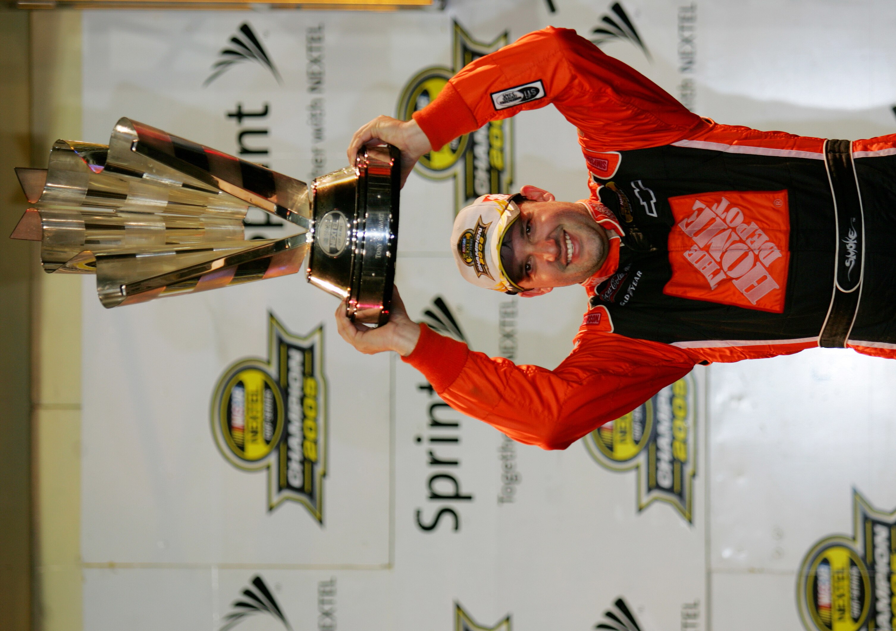 HOMESTEAD, FL - NOVEMBER 20:  Tony Stewart, driver of the #20 Home Depot Chevrolet, celebrates winning the championship during the NASCAR Nextel Cup Ford 400 on November 20, 2005 at the Homestead-Miami Superspeedway in Homestead, Florida.  (Photo by Darre