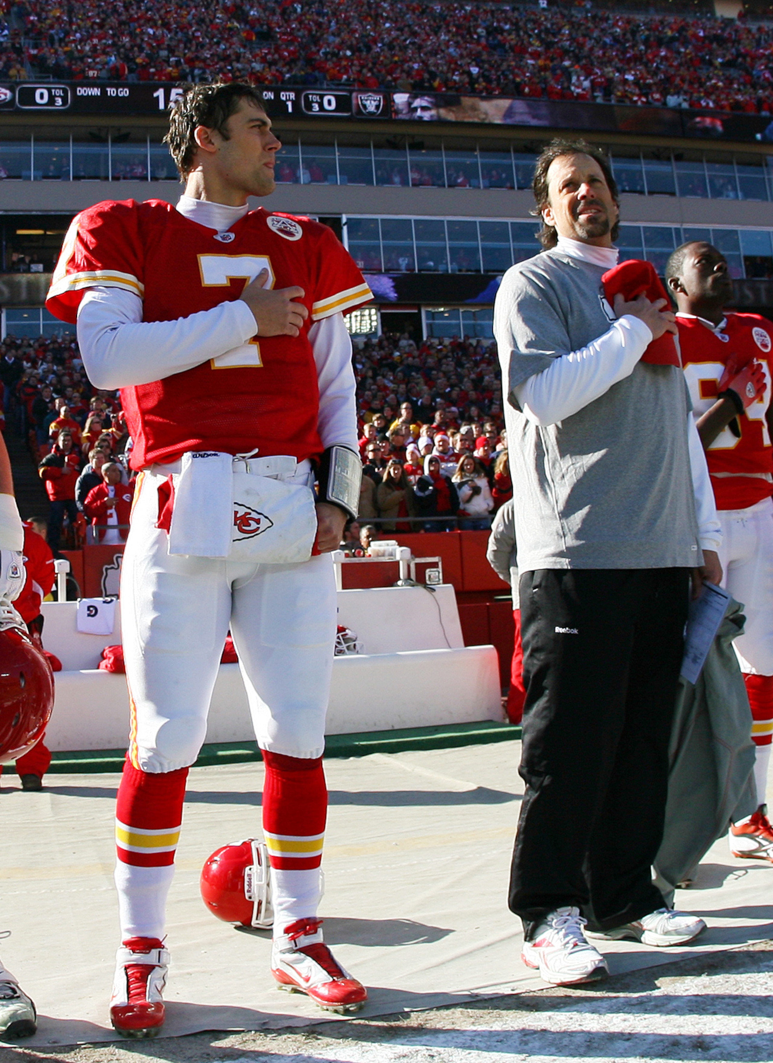 KANSAS CITY, MO - JANUARY 02: Quarterback Matt Cassel #7 and head coach Todd Haley of the Kansas City Chiefs observe the national anthem before a game against the Oakland Raiders at Arrowhead Stadium on January 2, 2011 in Kansas City, Missouri. (Photo b KANSAS CITY, MO - JANUARY 02: Quarterback Matt Cassel #7 and head coach Todd Haley of the Kansas City Chiefs observe the national anthem before a game against the Oakland Raiders at Arrowhead Stadium on January 2, 2011 in Kansas City, Missouri. (Photo b