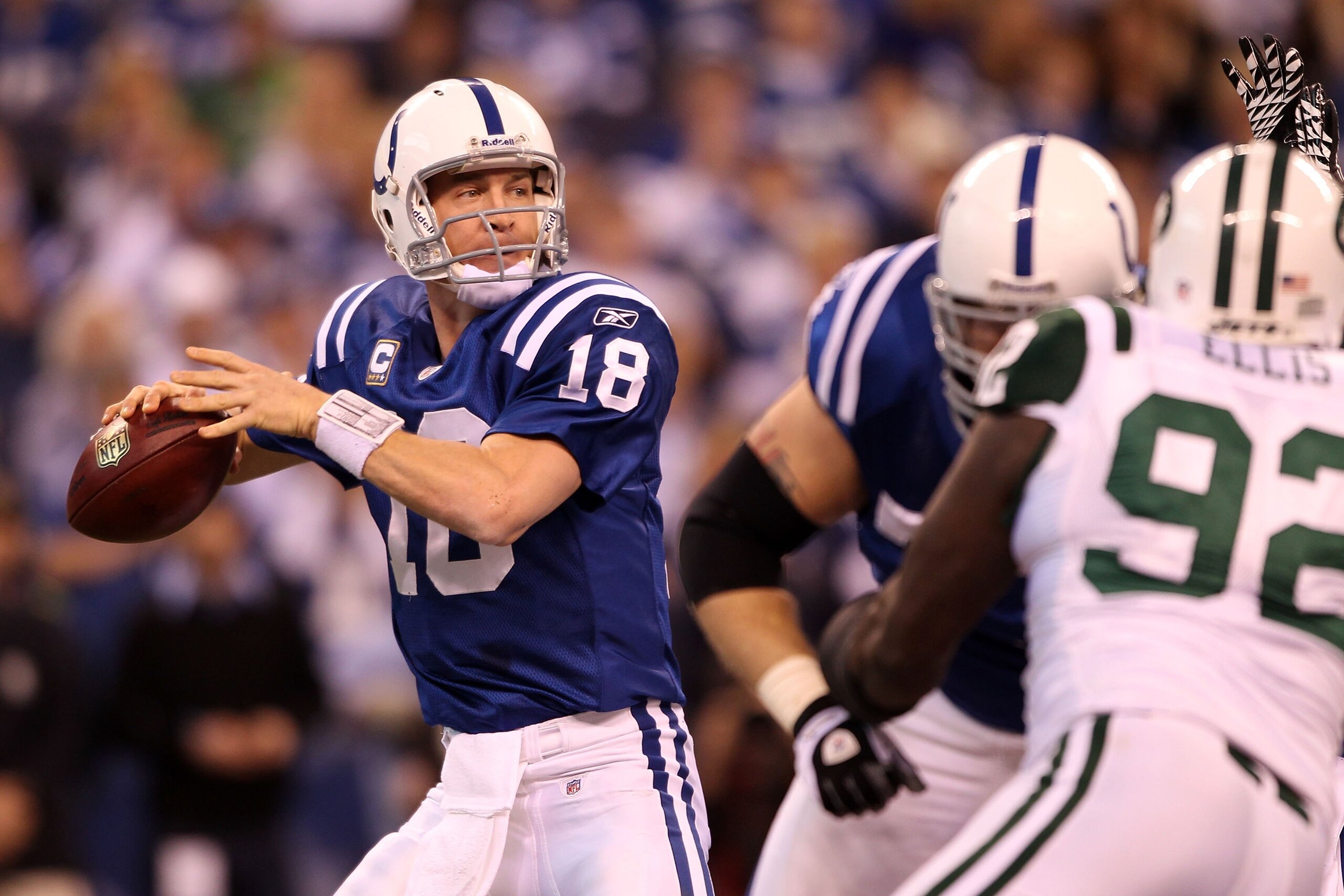 INDIANAPOLIS - JANUARY 24:  Quarterback Peyton Manning #18 of the Indianapolis Colts looks to pass the ball against the New York Jets during the AFC Championship Game at Lucas Oil Stadium on January 24, 2010 in Indianapolis, Indiana. The Colts defeated th