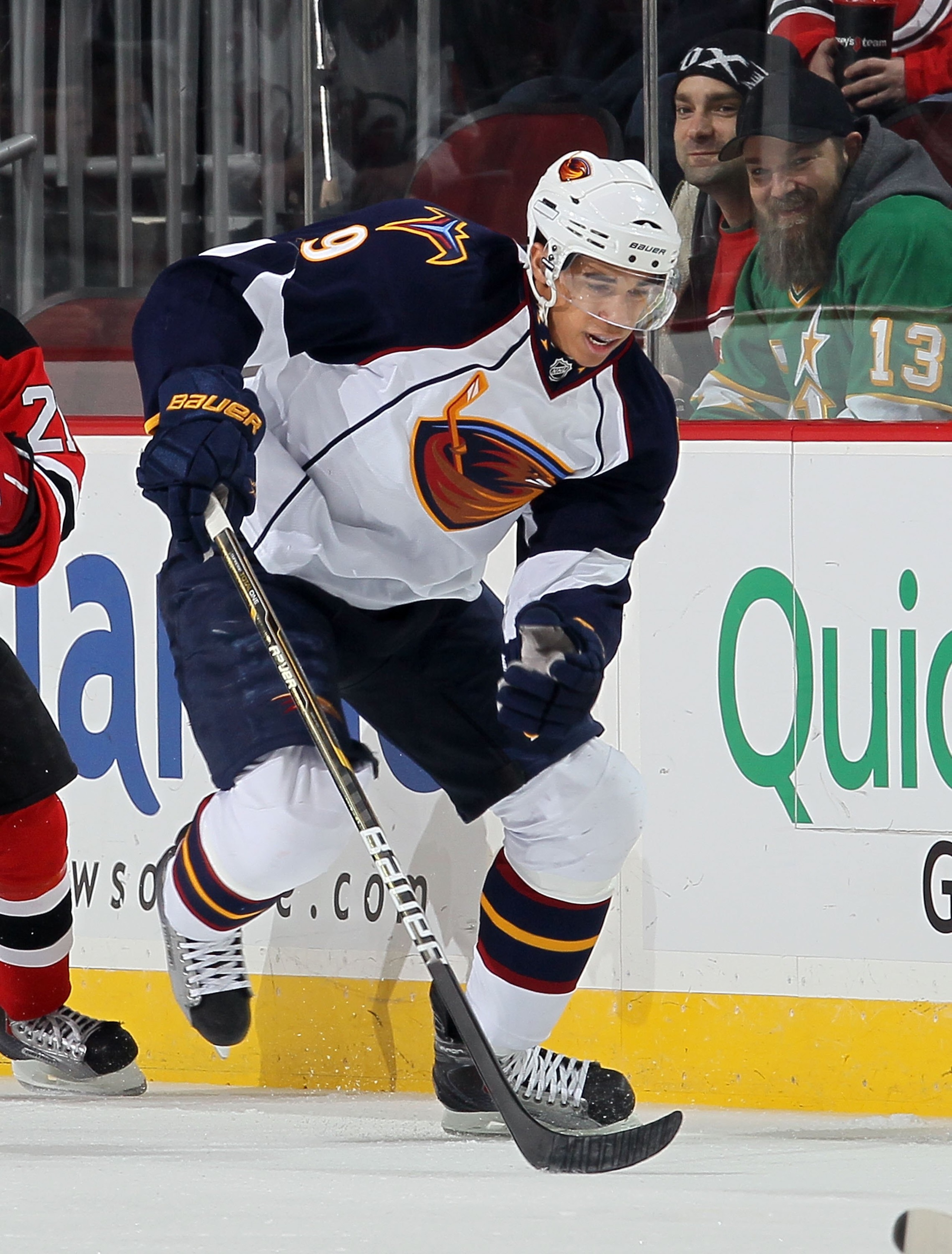 NEWARK, NJ - DECEMBER 31: Evander Kane #9 of the Atlanta Thrashers skates against the New Jersey Devils at the Prudential Center on December 31, 2010 in Newark, New Jersey. The Devils defeated the Thrashers 3-1.  (Photo by Jim McIsaac/Getty Images)
