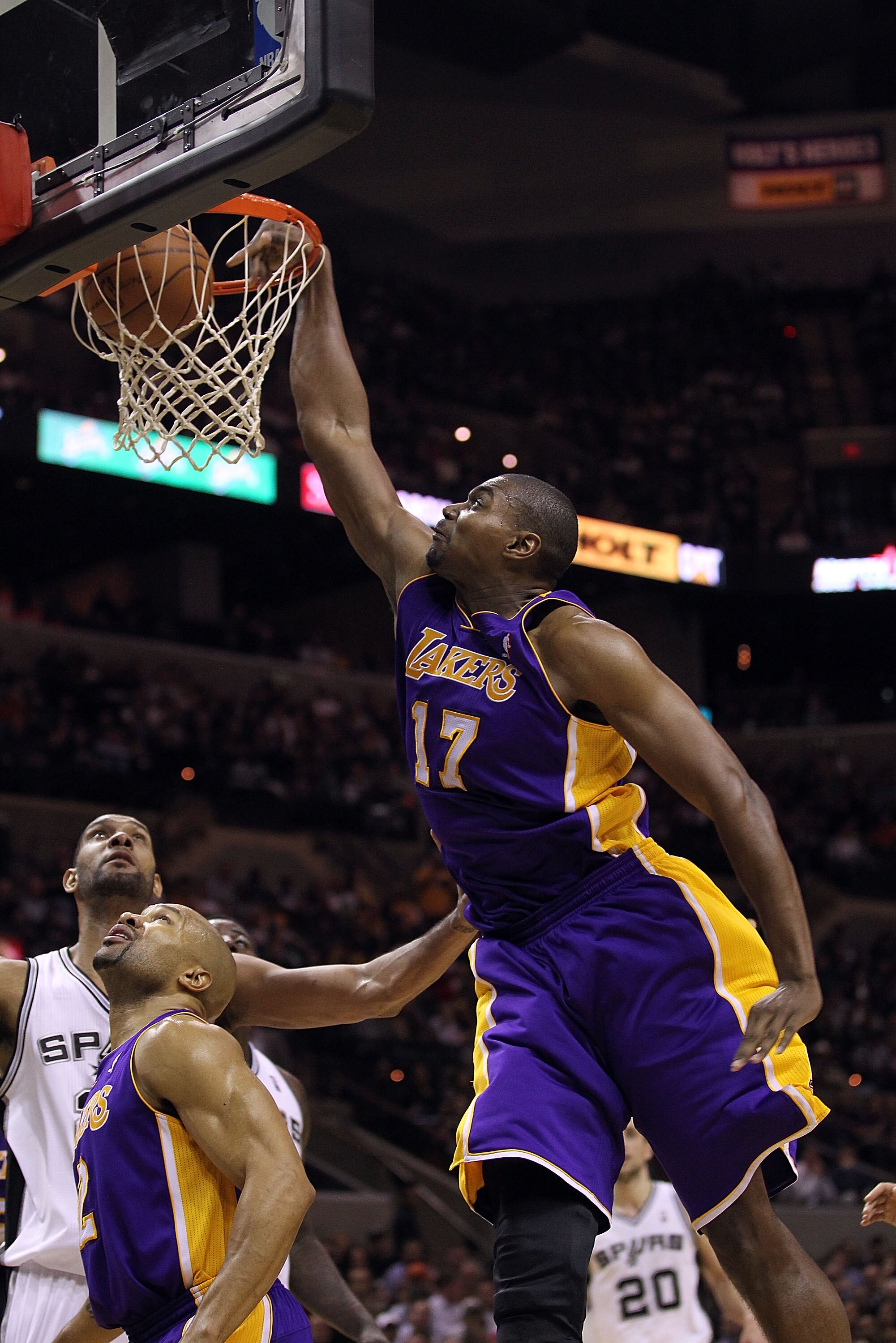 SAN ANTONIO, TX - DECEMBER 28:  Center Andrew Bynum #17 of the Los Angeles Lakers slams the ball against the San Antonio Spurs at AT&T Center on December 28, 2010 in San Antonio, Texas.  NOTE TO USER: User expressly acknowledges and agrees that, by downlo