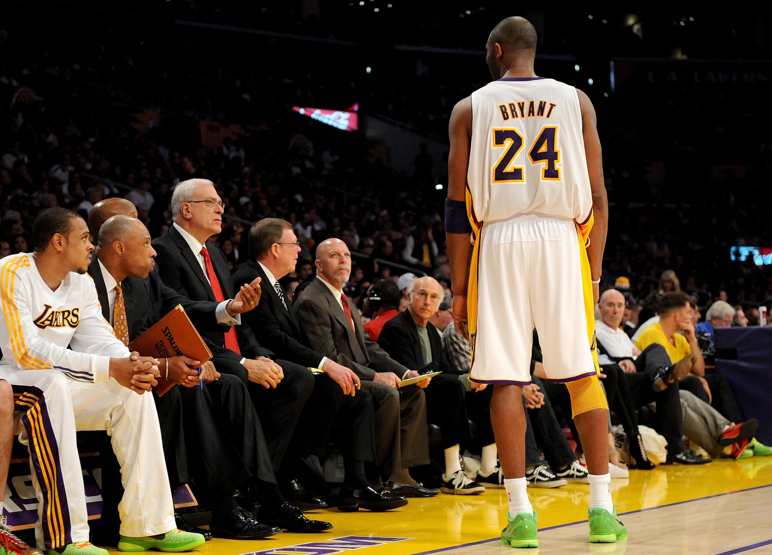 LOS ANGELES, CA - DECEMBER 25:  Kobe Bryant #24 talks with head coach Phil Jackson of the Los Angeles Lakers during the game against the Miami Heat at Staples Center on December 25, 2010 in Los Angeles, California. NOTE TO USER: User expressly acknowledge