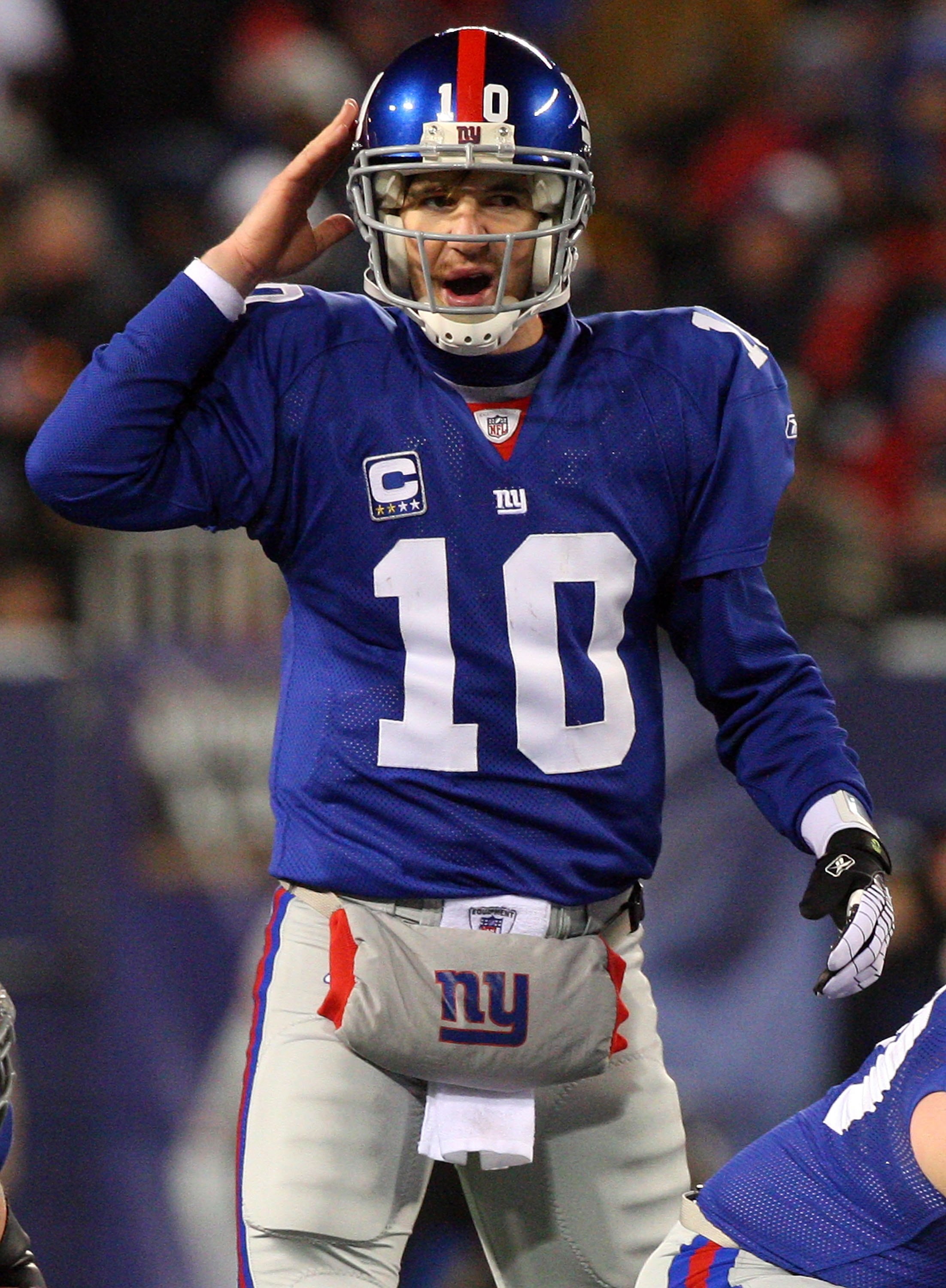 EAST RUTHERFORD, NJ - DECEMBER 21:  Eli Manning #10 of the New York Giants looks on against the Carolina Panthers on December 21, 2008 at Giants Stadium in East Rutherford, New Jersey.  (Photo by Jim McIsaac/Getty Images)