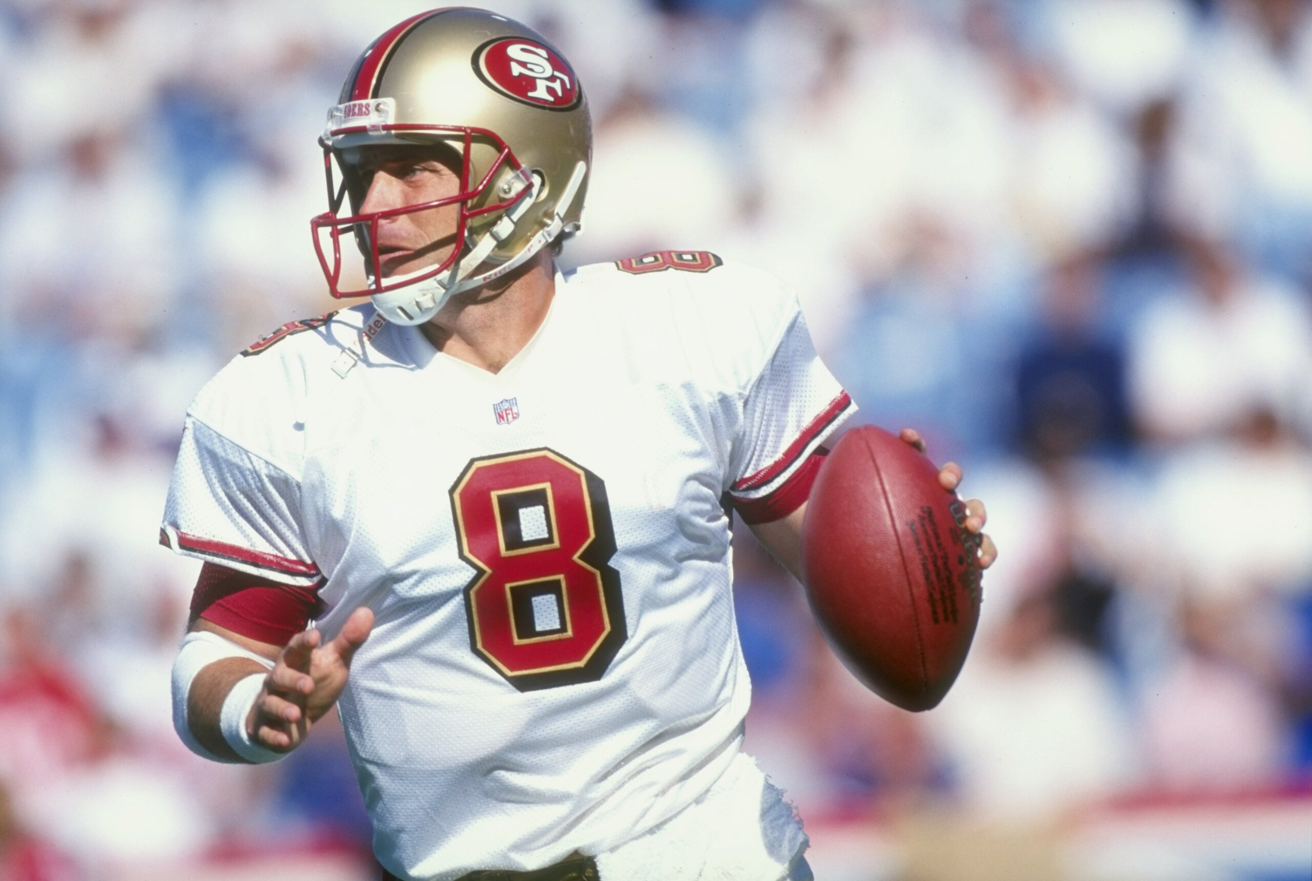 4 Oct 1998:  Quarterback Steve Young #8 of the San Francisco 49ers in action during a game against the Buffalo Bills at the Bills Stadium in Orchard Park, New York. The Bills defeated the 49ers 26-21.
