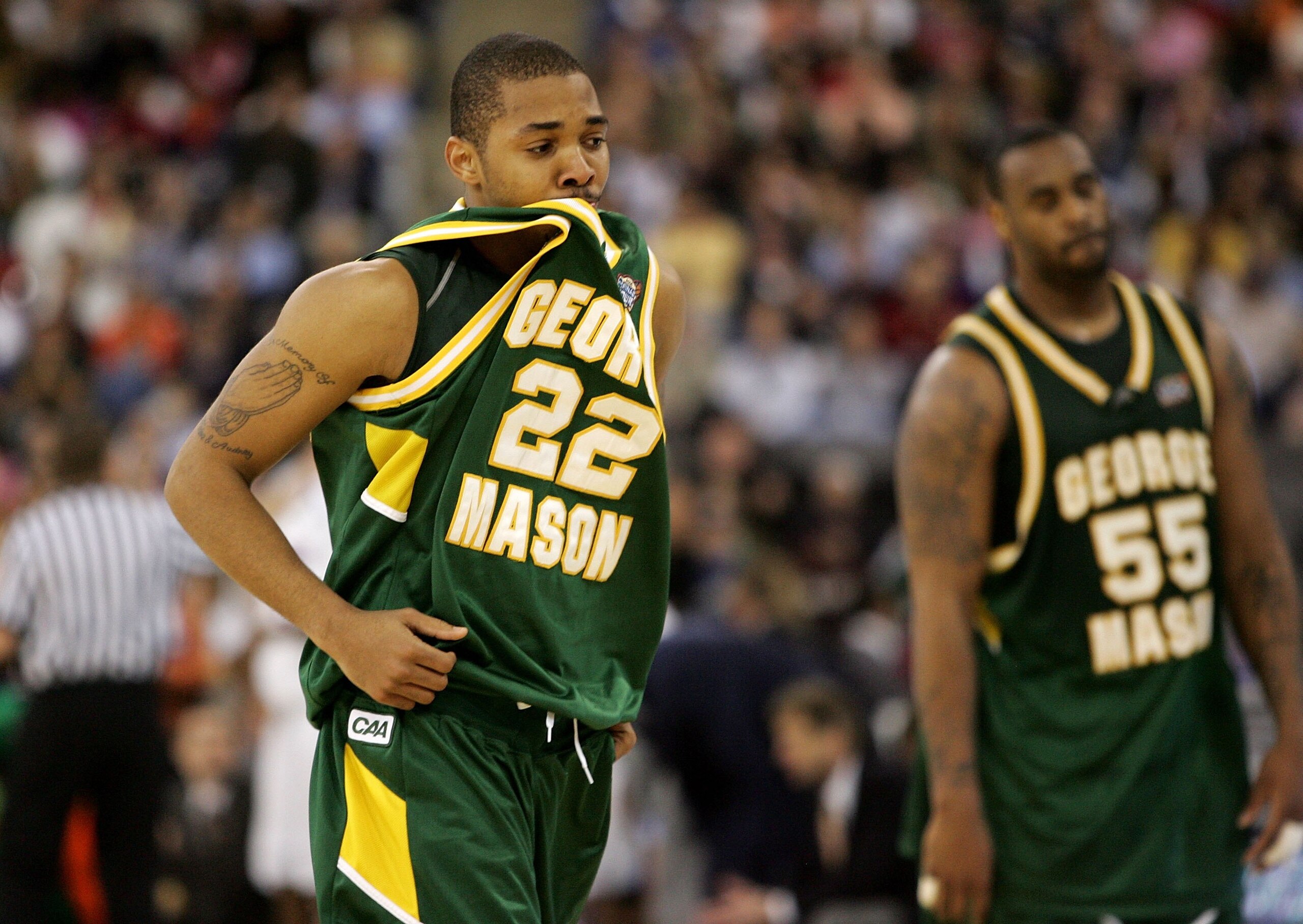 INDIANAPOLIS - APRIL 01:  Lamar Butler #22 of the George Mason Patriots reacts after losing to the Florida Gators 73-58 during the semifinal game of the NCAA Men's Final Four on April 1, 2006 at the RCA Dome in Indianapolis, Indiana.  (Photo by Streeter L