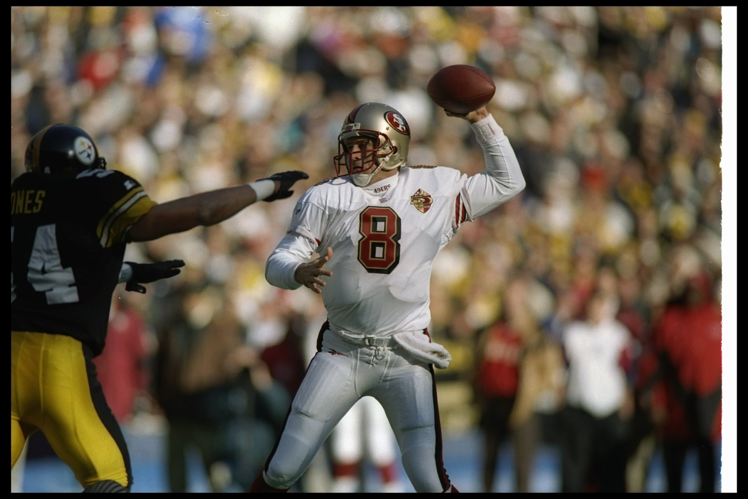 15 Dec 1996:  Quarterback Steve Young of the San Francisco 49ers looks to pass the ball during a game against the Pittsburgh Steelers at Three Rivers Stadium in Pittsburgh, Pennsylvania.  The 49ers won the game, 25-15. Mandatory Credit: Matthew Stockman
