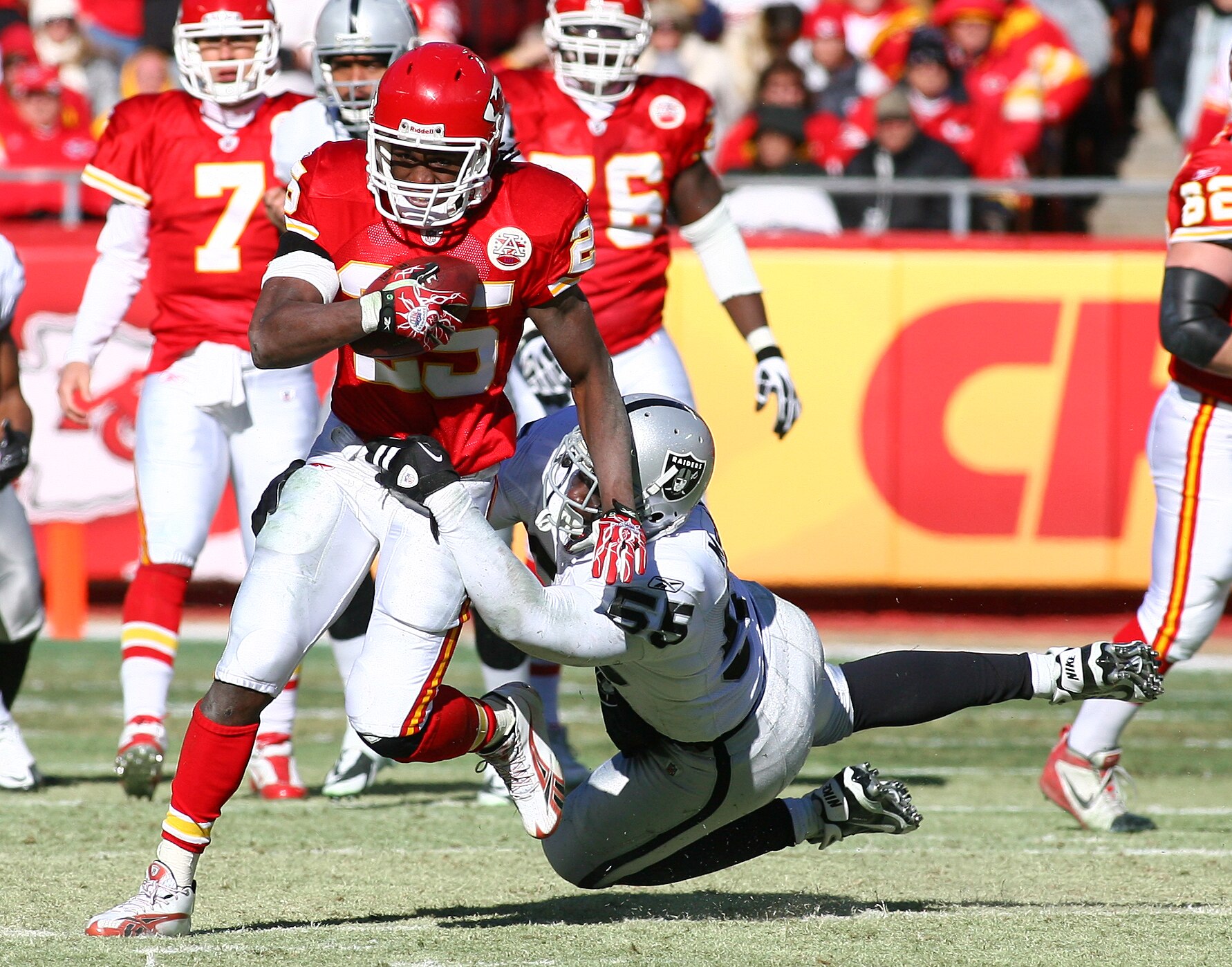 KANSAS CITY, MO - JANUARY 02:  Running back Jamaal Charles #25 of the Kansas City Chiefs is tackled by linebacker Rolando McClain #55 of the Oakland Raiders in a game at Arrowhead Stadium on January 2, 2011 in Kansas City, Missouri.  (Photo by Tim Umphrey