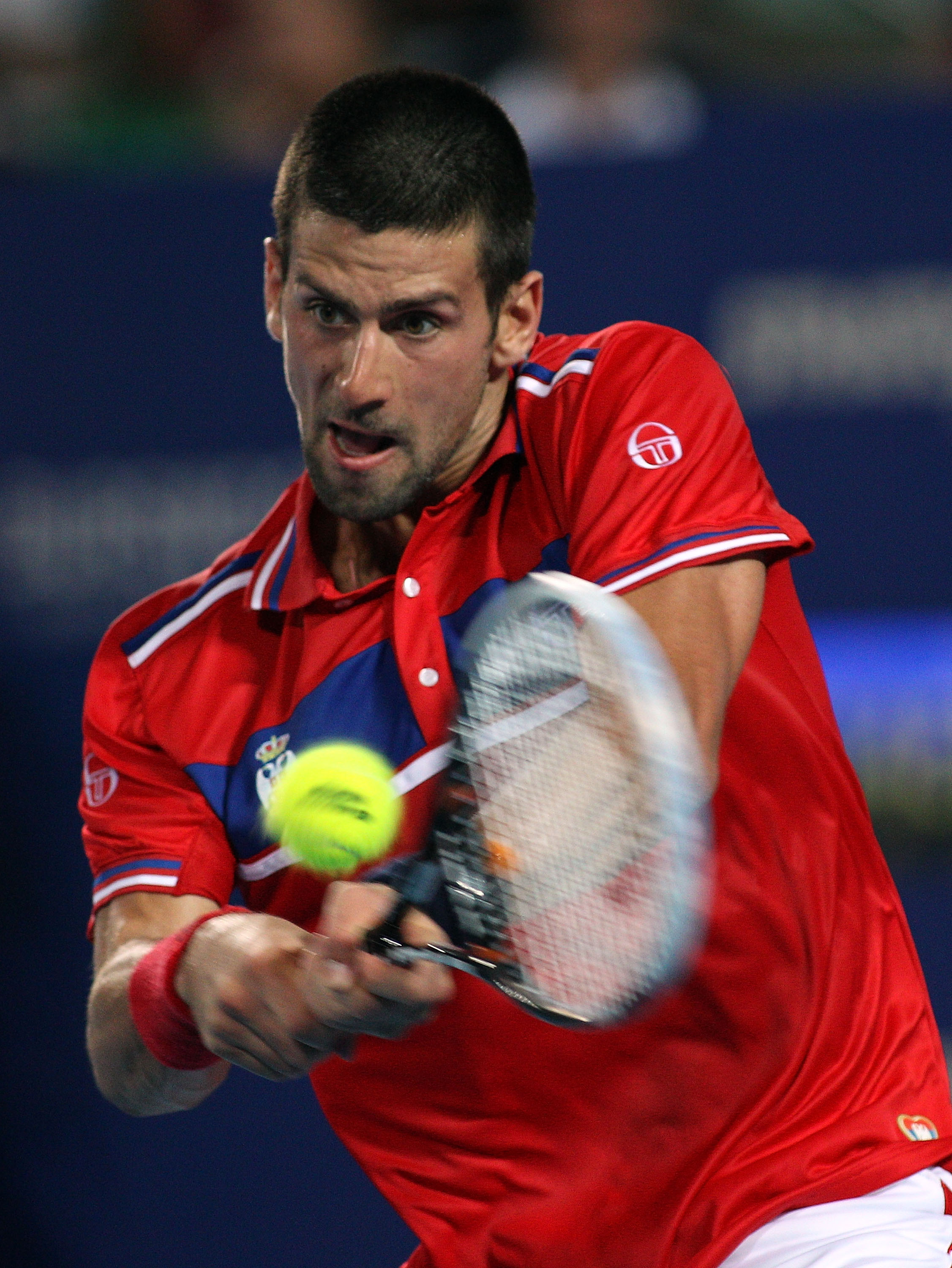 PERTH, AUSTRALIA - JANUARY 02:  Novak Djokovic of Serbia plays a return shot during his singles match against Andrey Golubev of Kazakhstan on day two of the Hopman Cup on January 2, 2011 in Perth, Australia.  (Photo by Paul Kane/Getty Images)