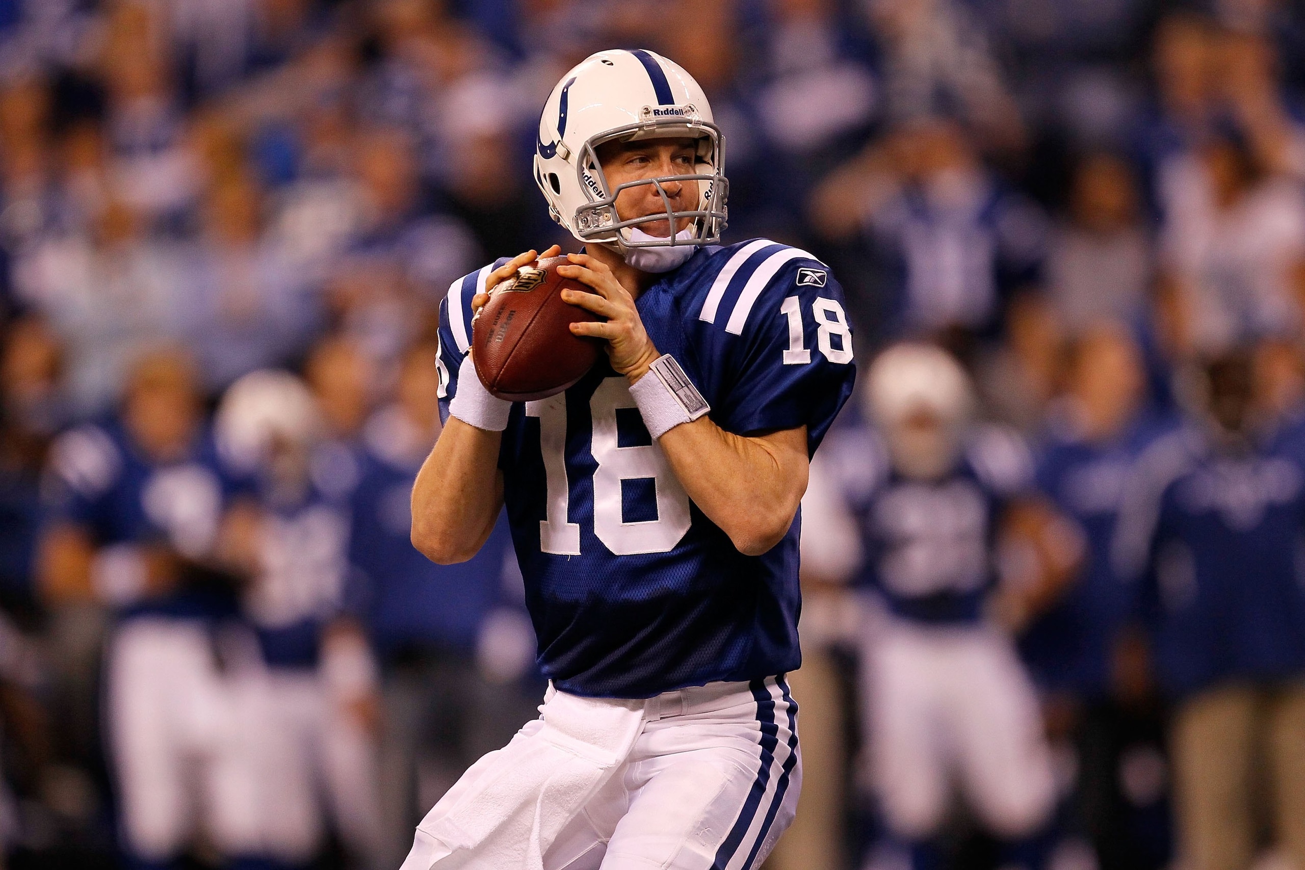 INDIANAPOLIS - JANUARY 24: Quarterback Peyton Manning #18 of the Indianapolis Colts looks to pass while playing against the New York Jets during the AFC Championship Game at Lucas Oil Stadium on January 24, 2010 in Indianapolis, Indiana. The Colts defea INDIANAPOLIS - JANUARY 24: Quarterback Peyton Manning #18 of the Indianapolis Colts looks to pass while playing against the New York Jets during the AFC Championship Game at Lucas Oil Stadium on January 24, 2010 in Indianapolis, Indiana. The Colts defea