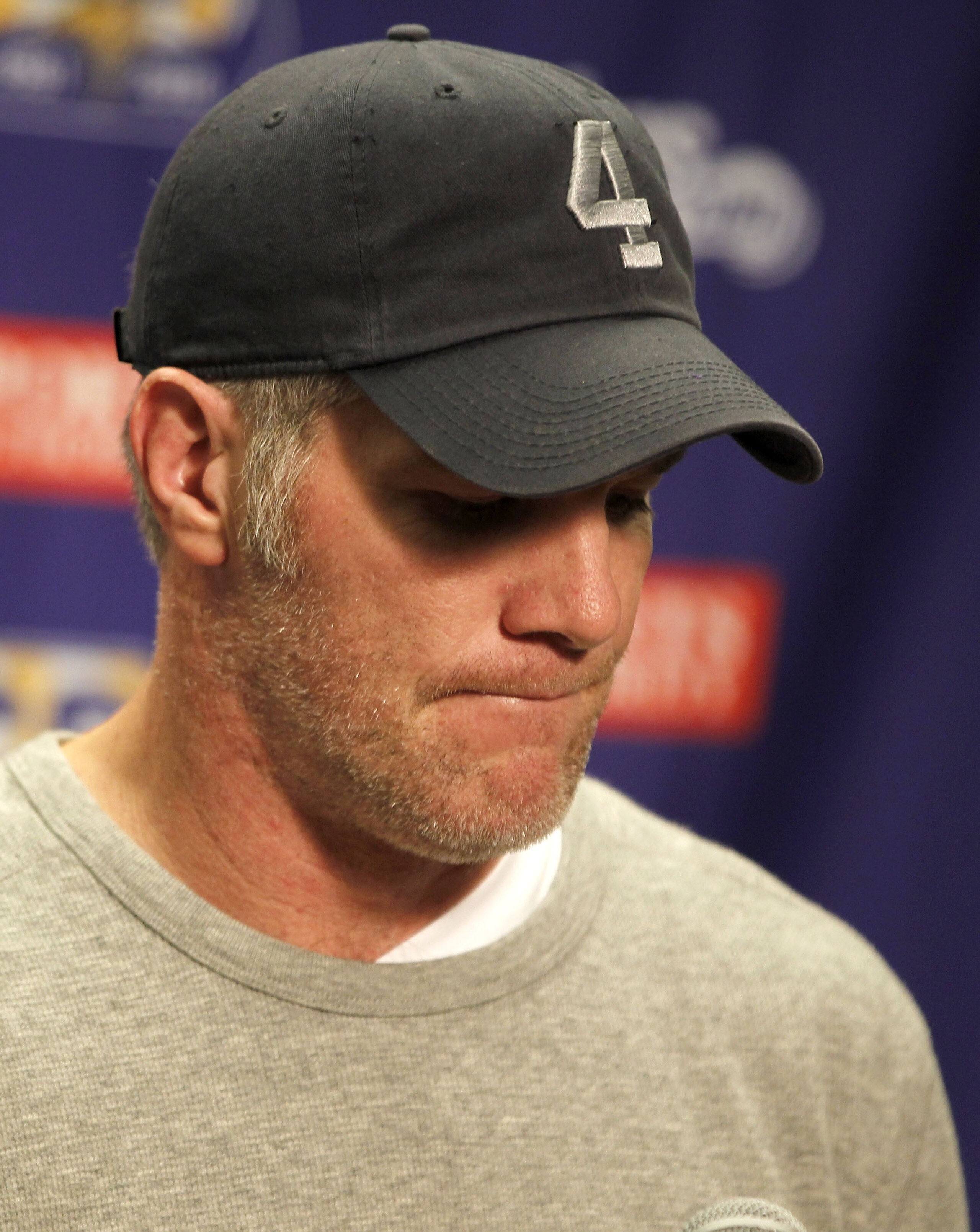 DETROIT, MI - JANUARY 02: Brett Favre #4 of the Minnesota Vikings talks at a post game press conference after a 13-20 loss to the Detroit Lions at Ford Field on January 2, 2011 in Detroit, Michigan. (Photo by Gregory Shamus/Getty Images) DETROIT, MI - JANUARY 02: Brett Favre #4 of the Minnesota Vikings talks at a post game press conference after a 13-20 loss to the Detroit Lions at Ford Field on January 2, 2011 in Detroit, Michigan. (Photo by Gregory Shamus/Getty Images)
