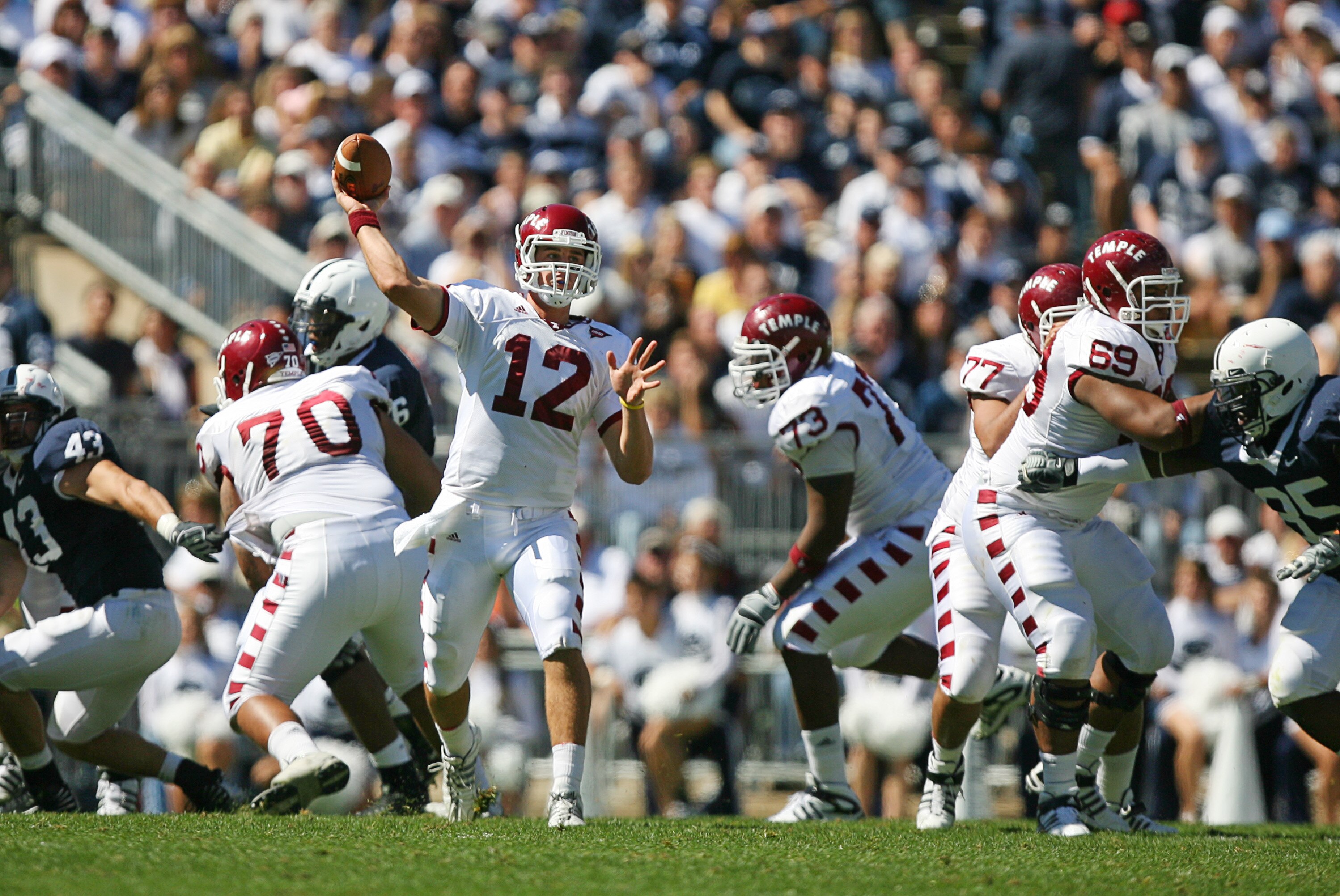 STATE COLLEGE, PA - SEPTEMBER 19: Quarterback Vaughn Charlton #12 of the Temple Owls throws a pass during a game against the Penn State Nittany Lions on September 19, 2009 at Beaver Stadium in State College, Pennsylvania. (Photo by Hunter Martin/Getty Ima