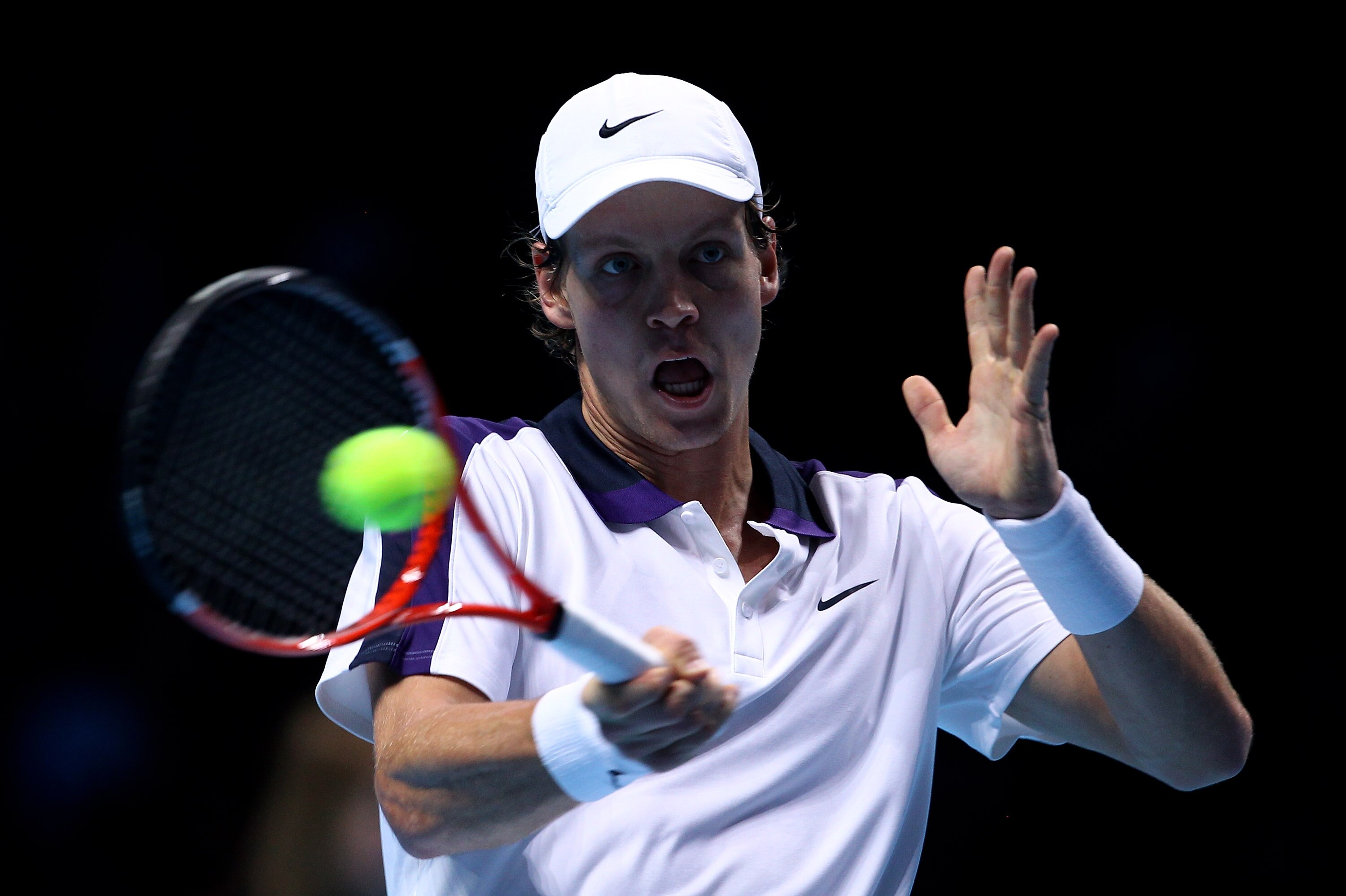 LONDON, ENGLAND - NOVEMBER 26:  Tomas Berdych of Czech Republic returns the ball during his men's singles match against Rafael Nadal of Spain during the ATP World Tour Finals at O2 Arena on November 26, 2010 in London, England.  (Photo by Julian Finney/Ge