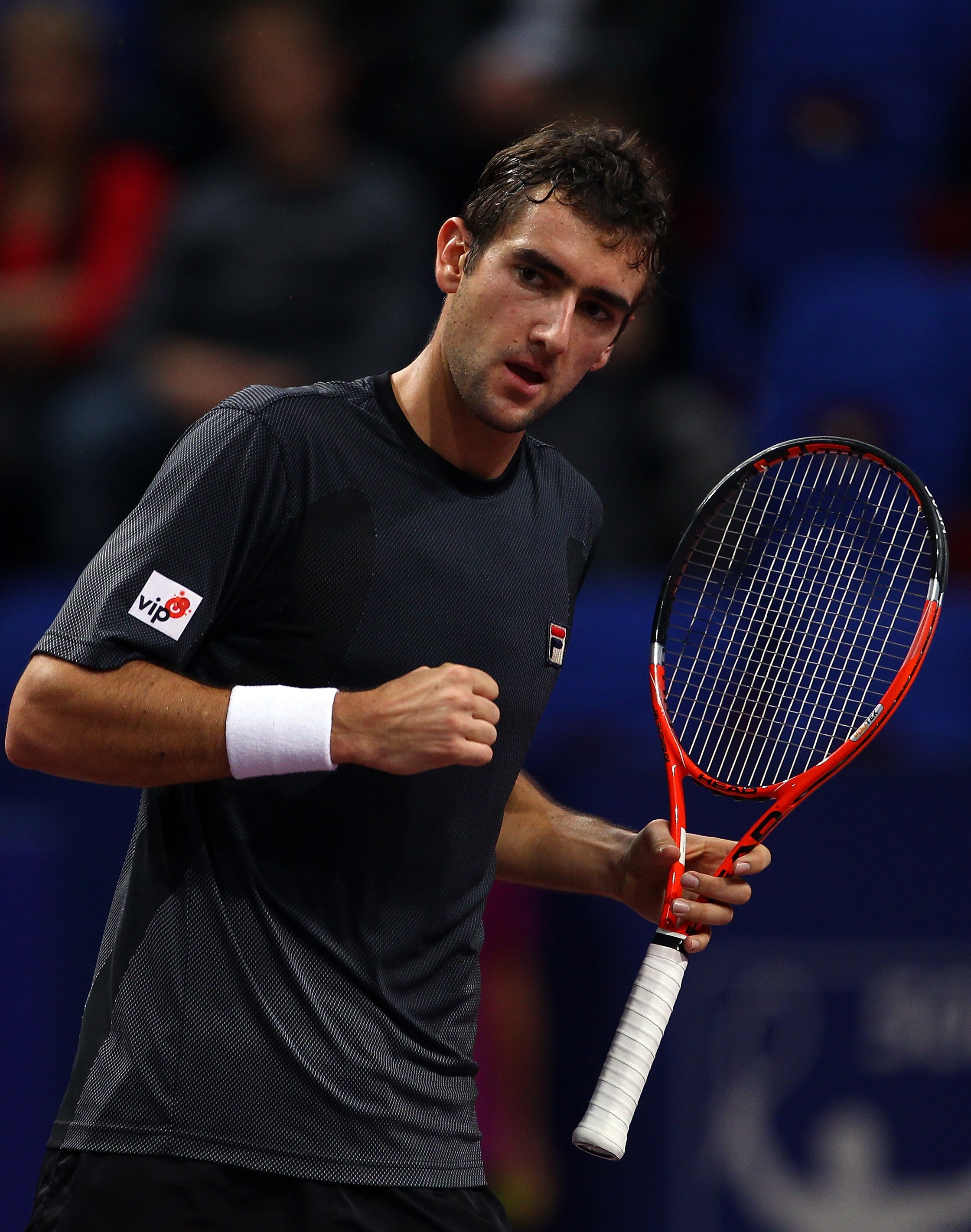 BASEL, SWITZERLAND - NOVEMBER 04:  Marin Cilic of Croatia celebrates winning a game in his match against David Nalbandian of Argentina during Day Four of the Davidoff Swiss Indoors Tennis at St Jakobshalle on November 4, 2010 in Basel, Switzerland.  (Phot