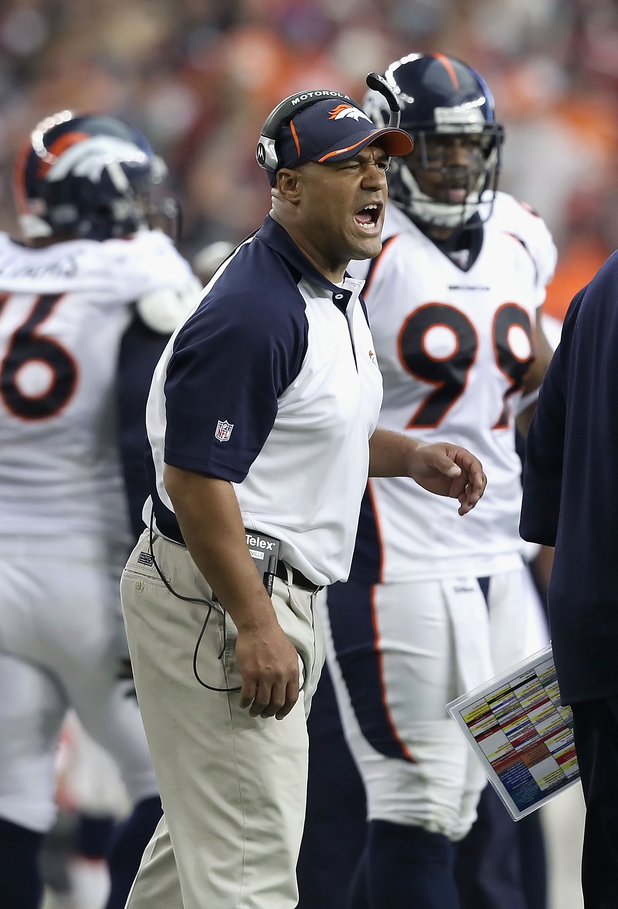 GLENDALE, AZ - DECEMBER 12:  Interim head coach Eric Studesville of the Denver Broncos reacts during the NFL game against the Arizona Cardinals at the University of Phoenix Stadium on December 12, 2010 in Glendale, Arizona. The Cardinals defeated the Bron