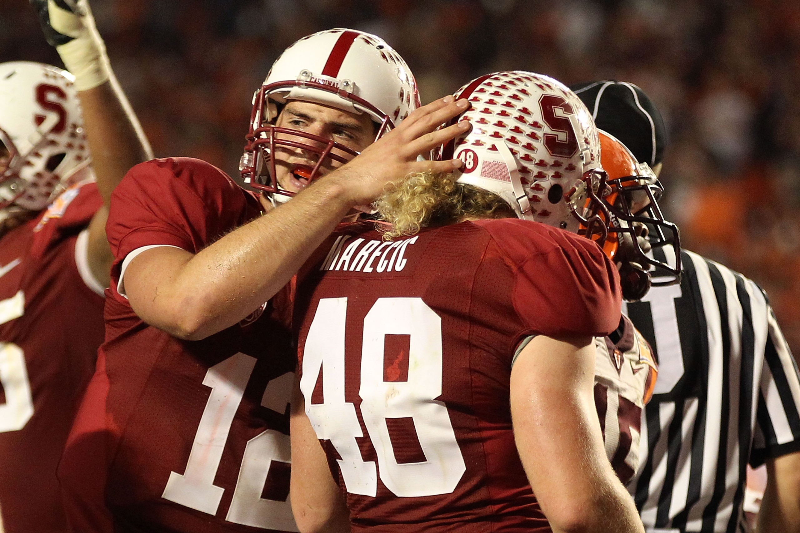 MIAMI, FL - JANUARY 03:  (L-R) Andrew Luck #12 and Owen Marecic #48 of the Stanford Cardinal celebrate after Marecic scored a 1-yard rushing touchdown in the third quarter against the Virginai Tech Hokies during the 2011 Discover Orange Bowl at Sun Life S