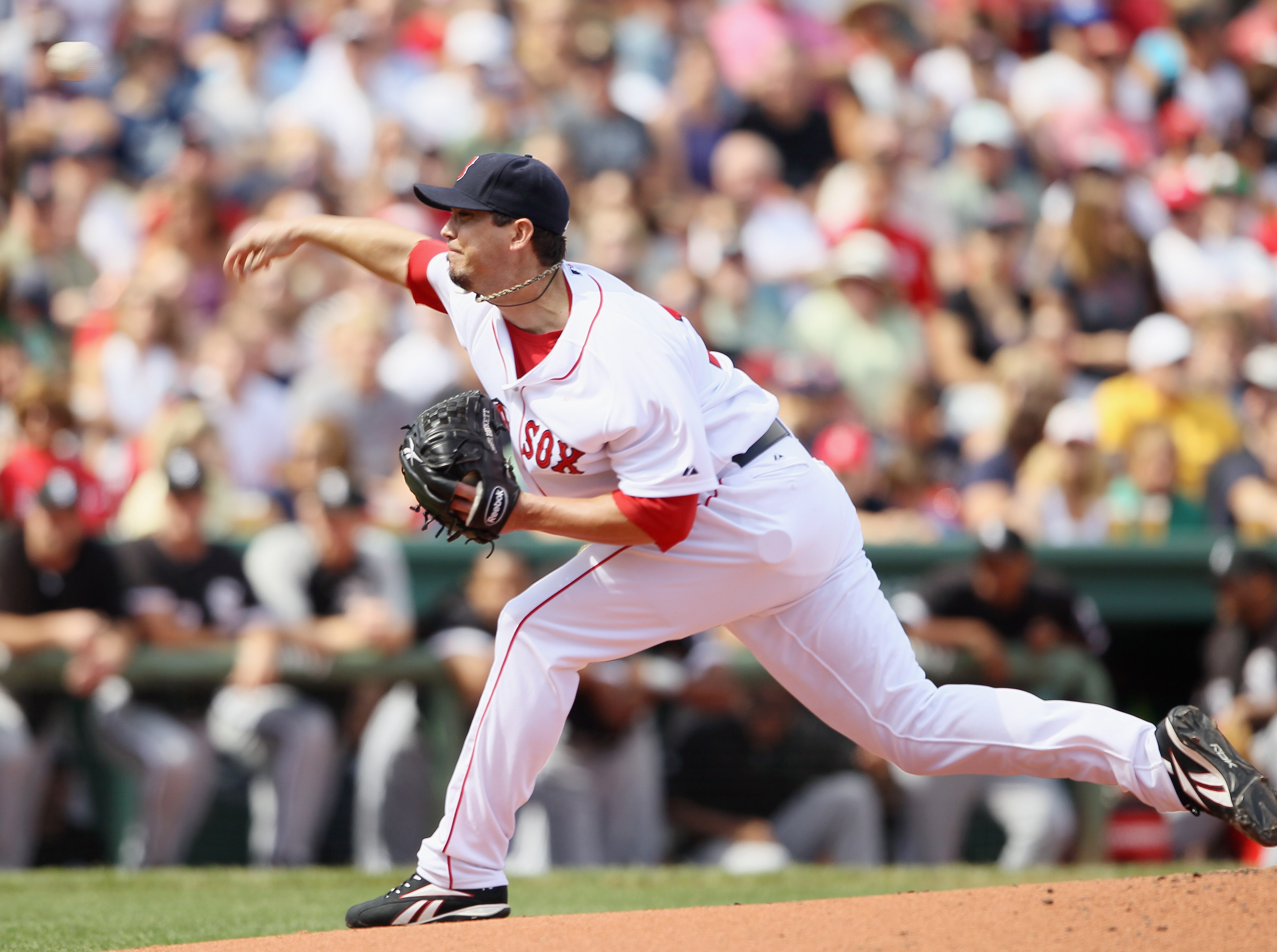 BOSTON - SEPTEMBER 05:  Josh Beckett #19 of the Boston Red Sox delivers a pitch in the first inning against the Chicago White Sox on September 5, 2010 at Fenway Park in Boston, Massachusetts.  (Photo by Elsa/Getty Images)