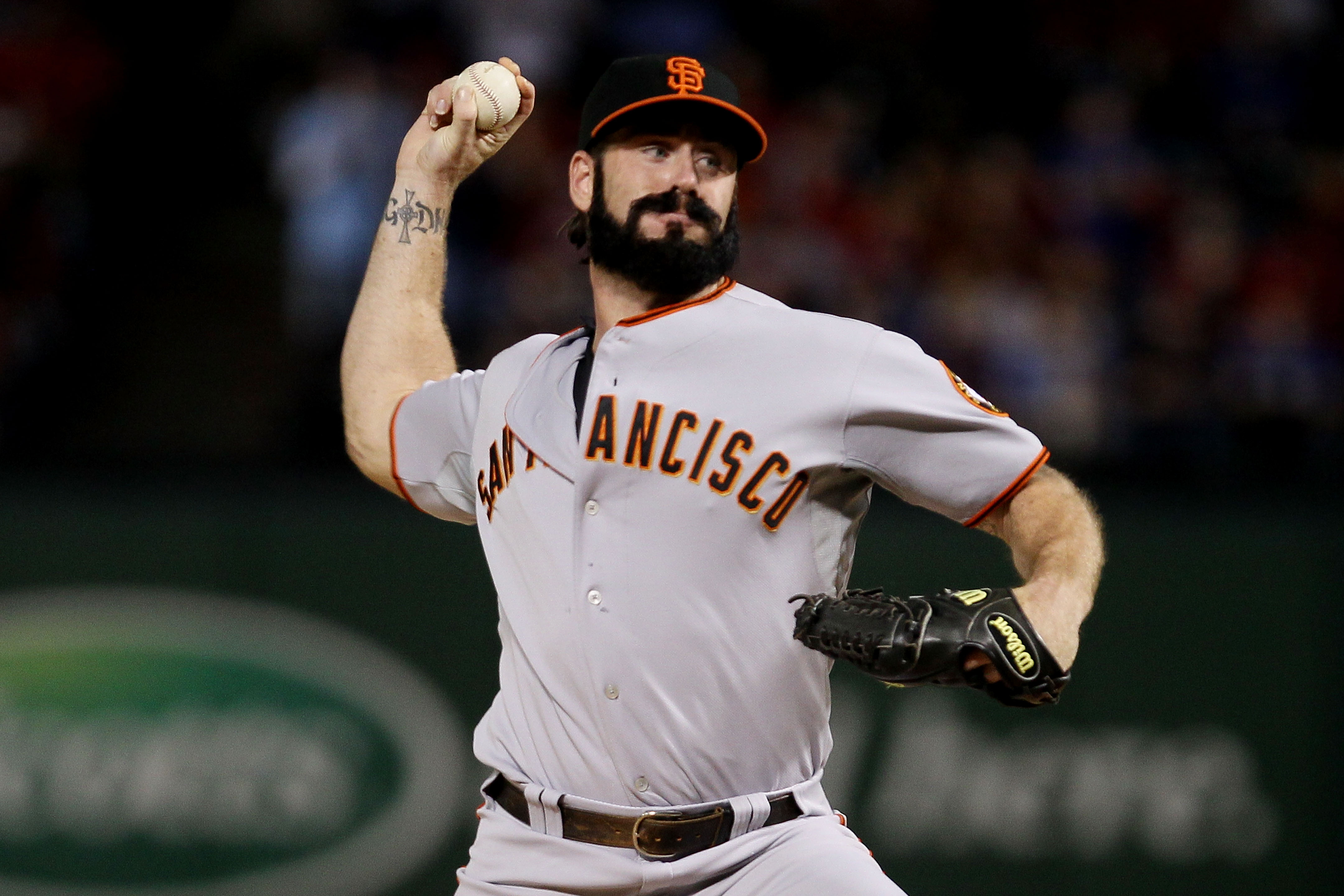 ARLINGTON, TX - OCTOBER 31:  Brian Wilson #38 of the San Francisco Giants pitches against the Texas Rangers in Game Four of the 2010 MLB World Series at Rangers Ballpark in Arlington on October 31, 2010 in Arlington, Texas.  (Photo by Elsa/Getty Images)