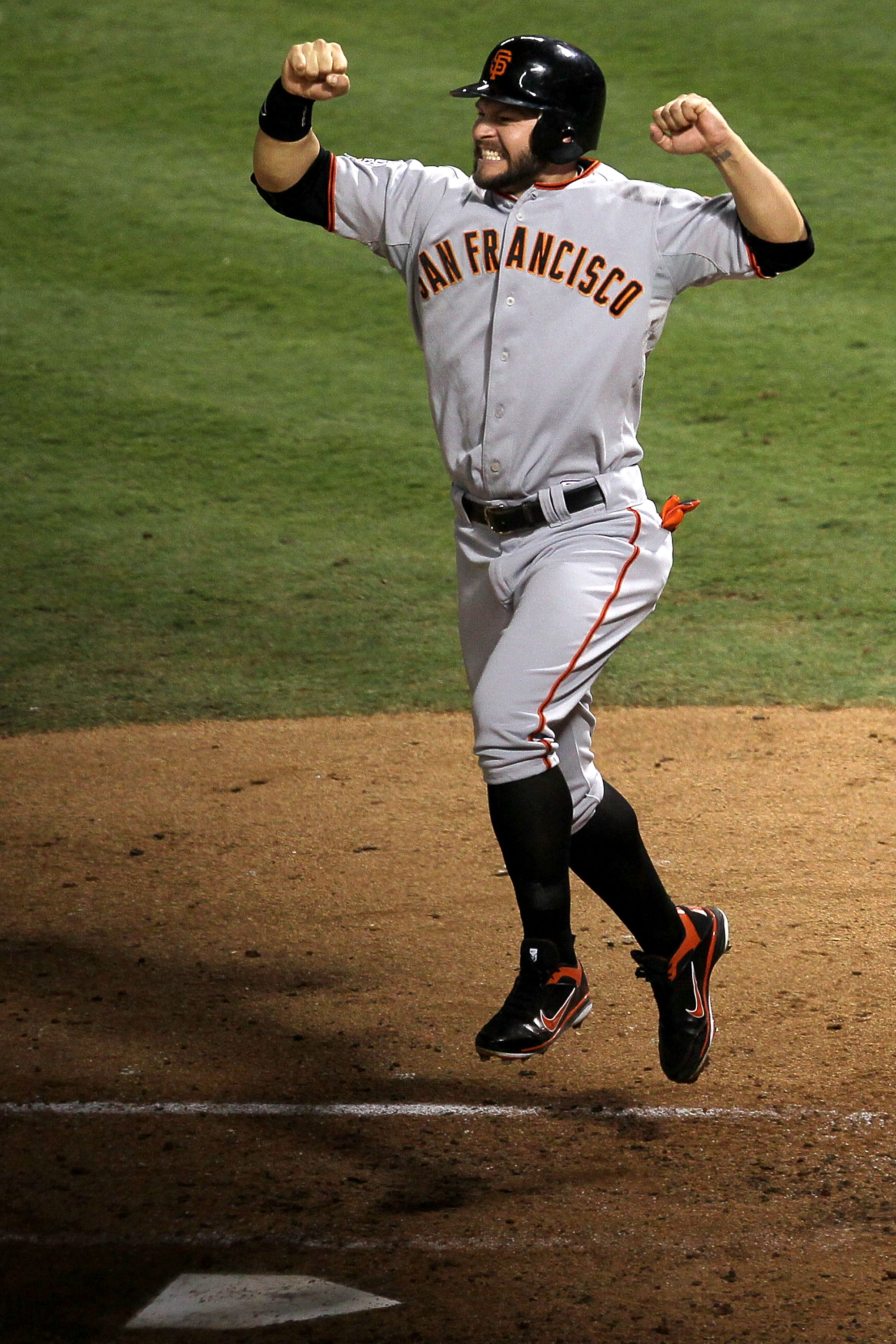 ARLINGTON, TX - NOVEMBER 01:  Cody Ross #13 of the San Francisco Giants celebrates after he scored on a 3-run home run hit by Edgar Renteria #16 in the seventh inning against the Texas Rangers in Game Five of the 2010 MLB World Series at Rangers Ballpark