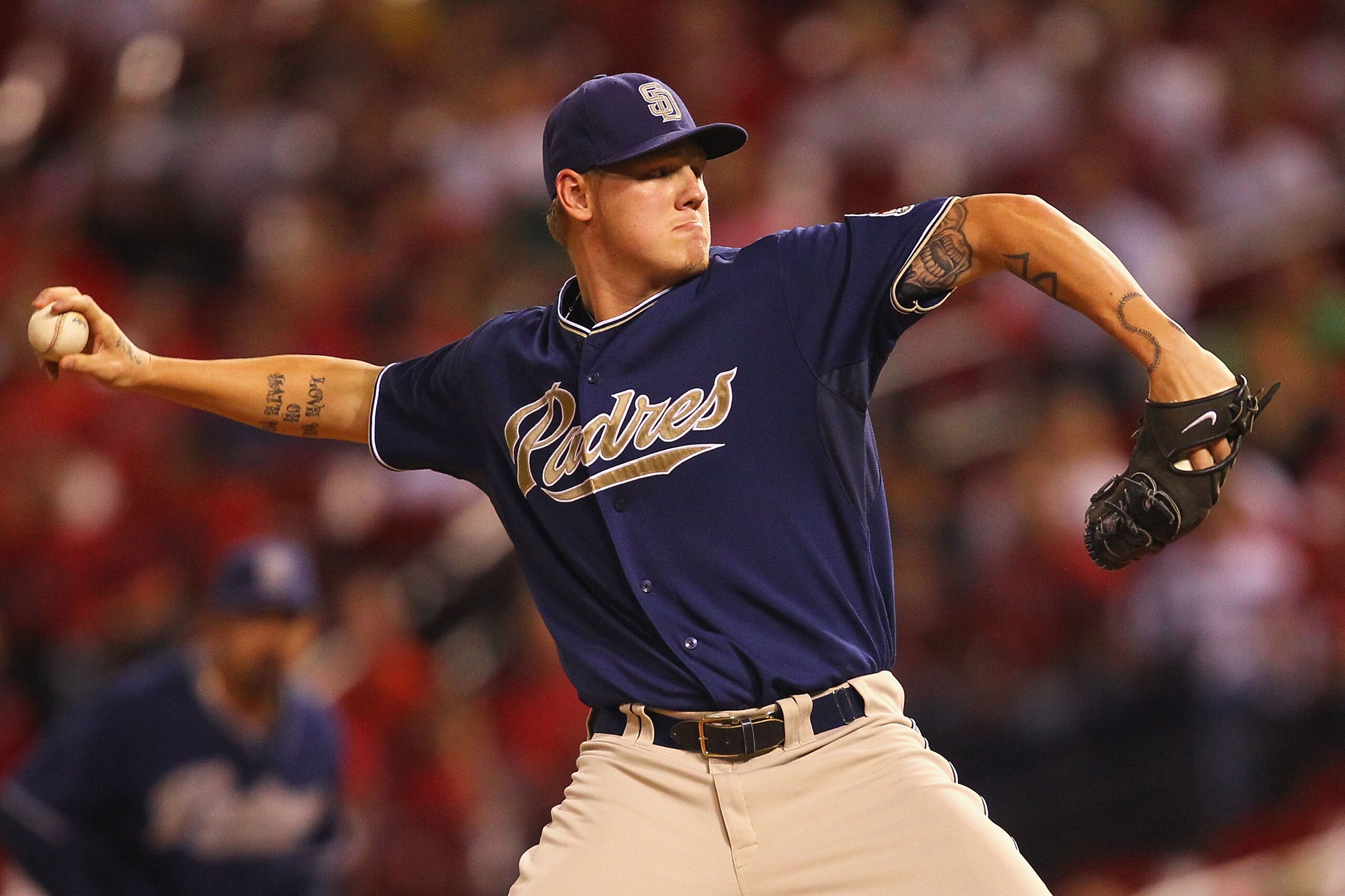 ST. LOUIS - SEPTEMBER 17: Starter Matt Latos #38 of the San Diego Padres pitches against the St. Louis Cardinals at Busch Stadium on September 17, 2010 in St. Louis, Missouri.  (Photo by Dilip Vishwanat/Getty Images)