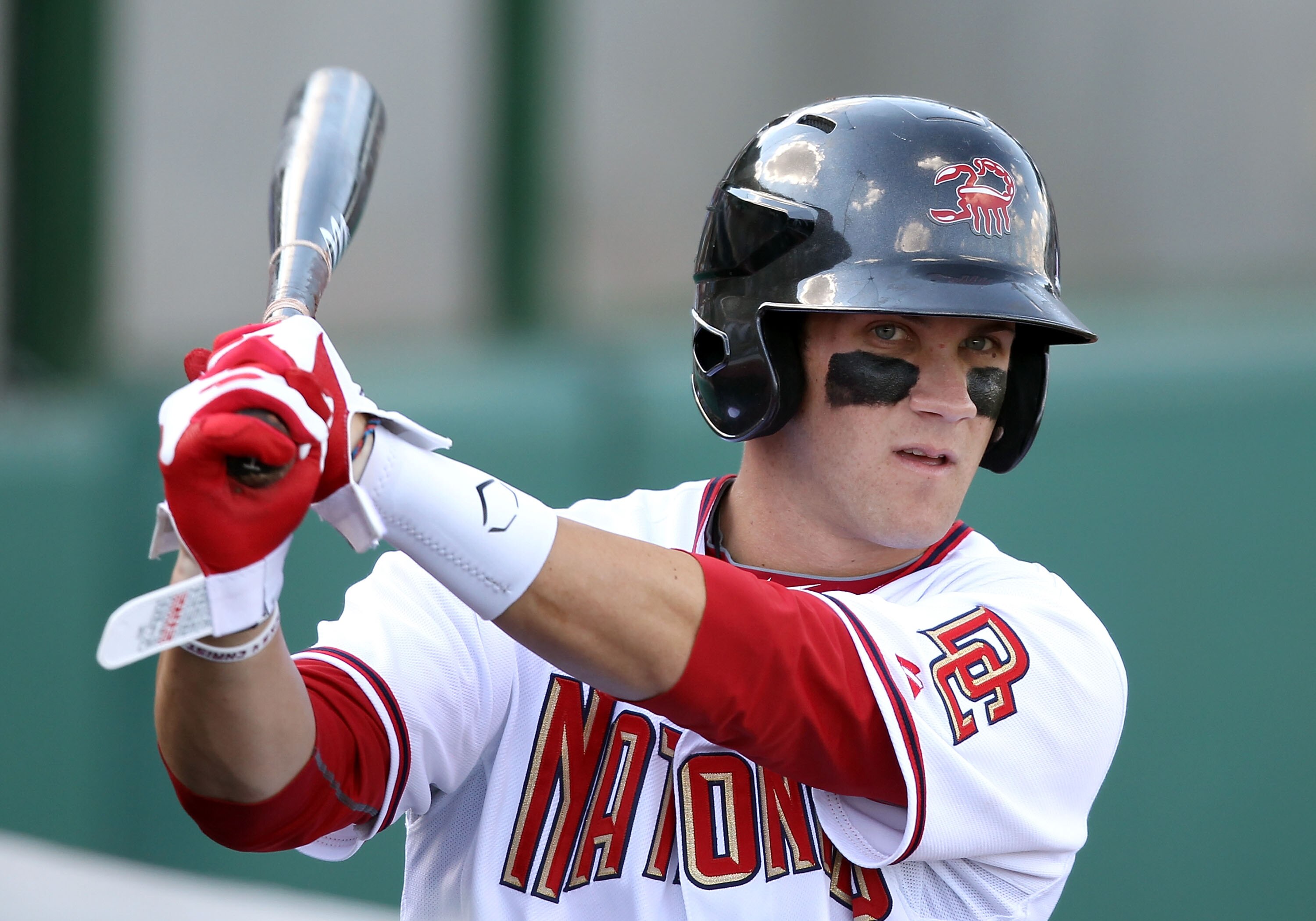 SCOTTSDALE, AZ - OCTOBER 23:  Washington Nationals prospect Bryce Harper #34, playing for the Scottsdale Scorpions, warms up on deck during the AZ Fall League game against the Phoenix Desert Dogs at Scottsdale Stadium on October 23, 2010 in Scottsdale, Ar