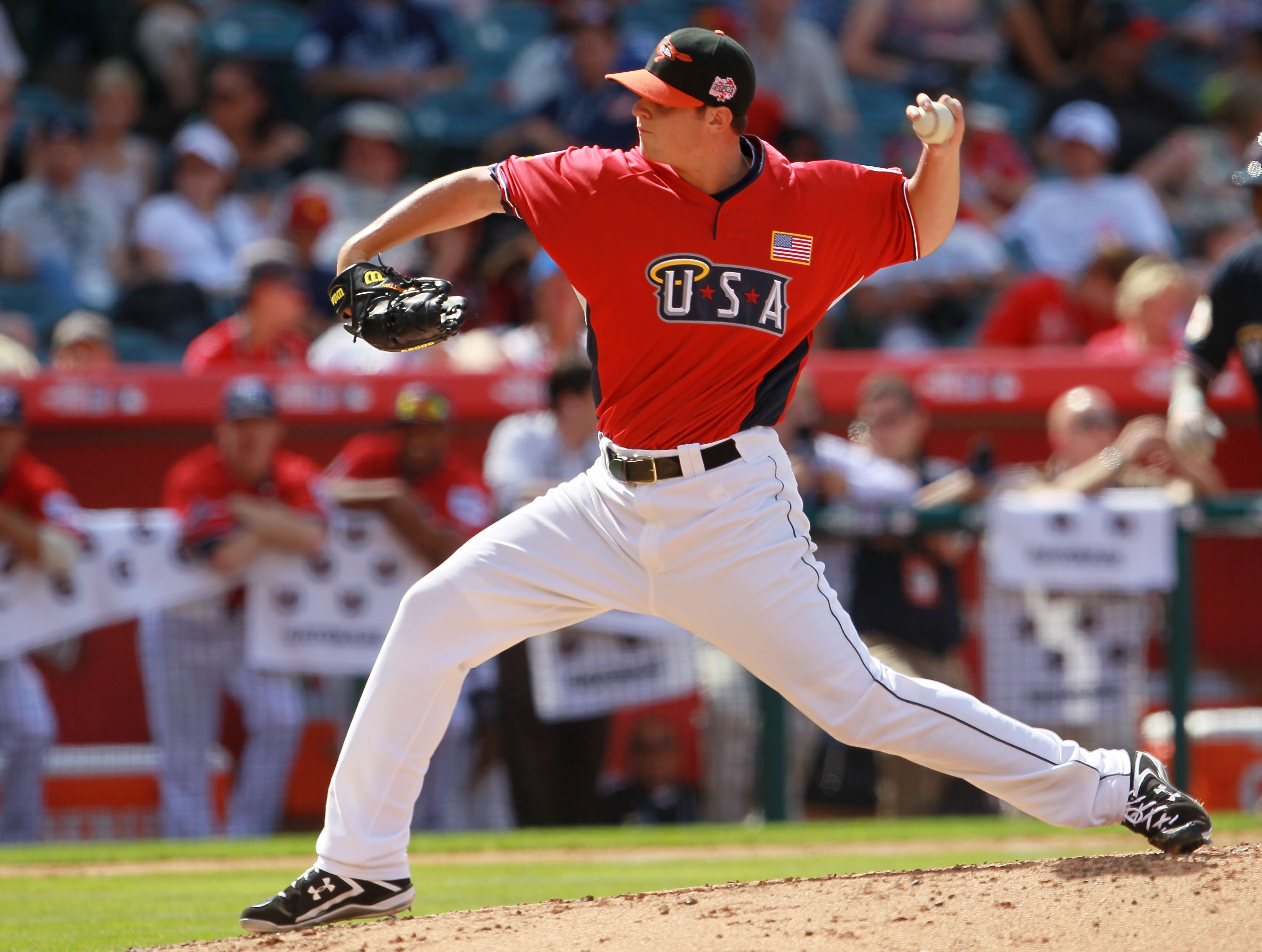 ANAHEIM, CA - JULY 11:  U.S. Futures All-Star Zach Britton #12 of the Baltimore Orioles throws a pitch during the 2010 XM All-Star Futures Game at Angel Stadium of Anaheim on July 11, 2010 in Anaheim, California.  (Photo by Jeff Gross/Getty Images)