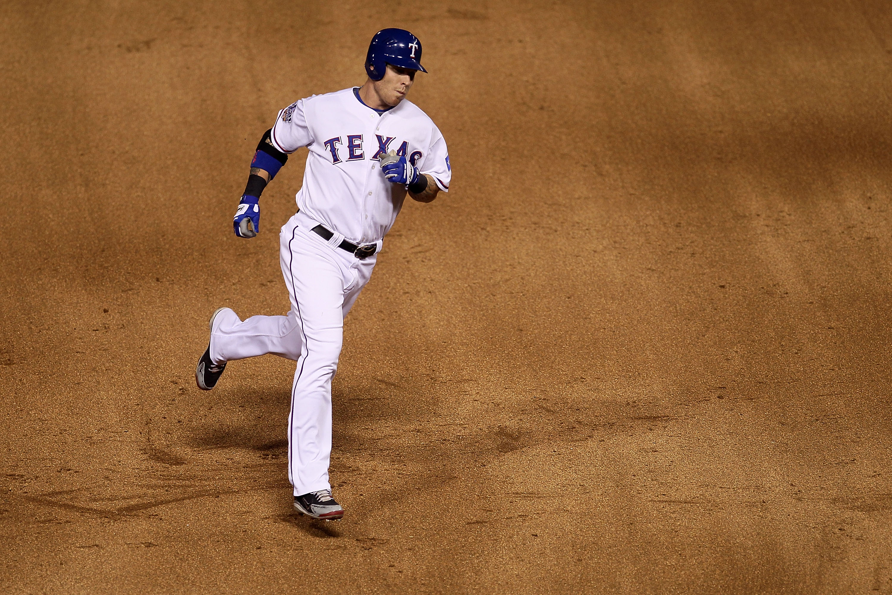 ARLINGTON, TX - OCTOBER 30:  Josh Hamilton #32 of the Texas Rangers rounds third base on his solo home run in the bottom of the fifth inning against the San Francisco Giants in Game Three of the 2010 MLB World Series at Rangers Ballpark in Arlington on Oc