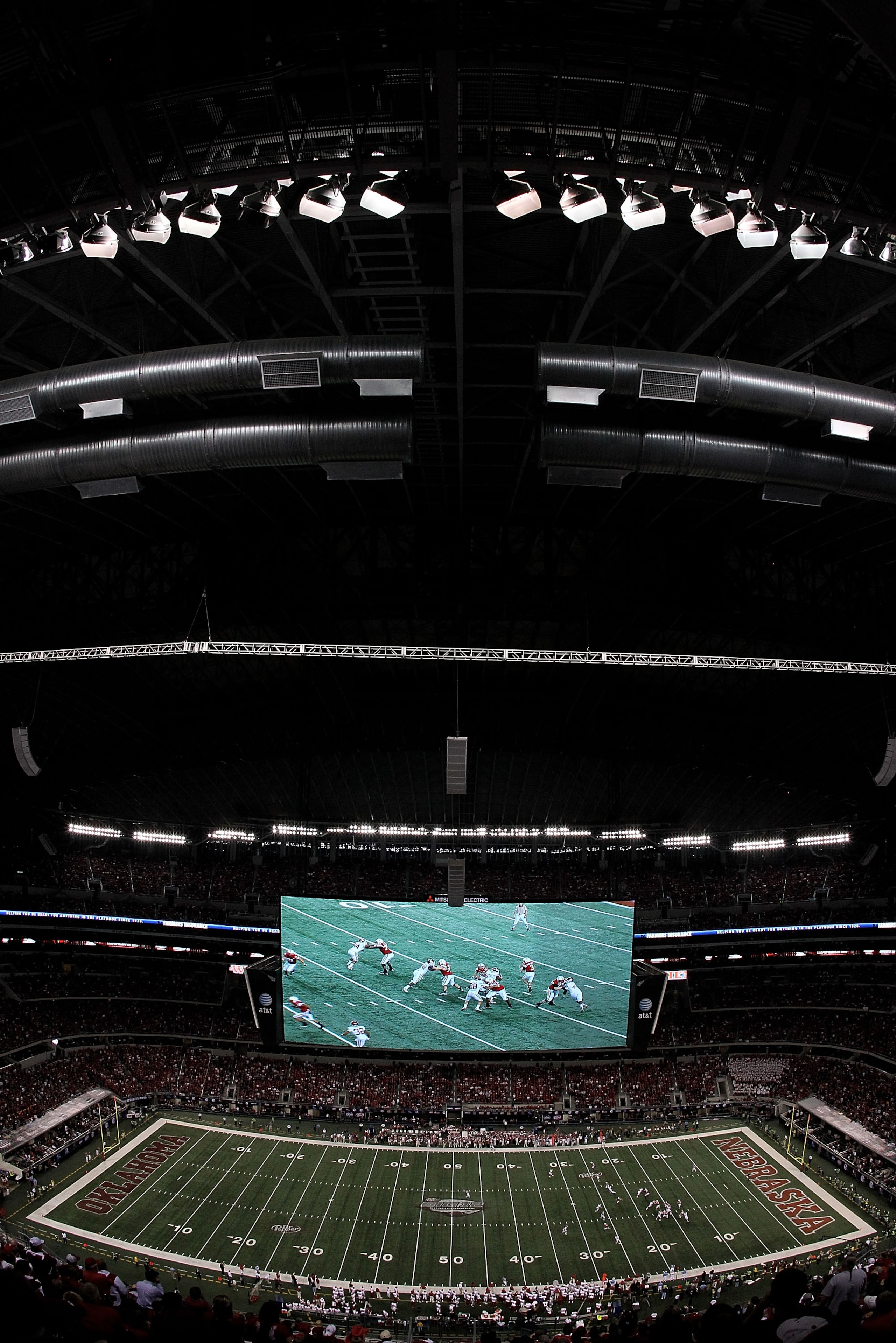 ARLINGTON, TX - DECEMBER 04: A general view of play between the Oklahoma Sooners and the Nebraska Cornhuskers during the Big 12 Championship at Cowboys Stadium on December 4, 2010 in Arlington, Texas. (Photo by Ronald Martinez/Getty Images) ARLINGTON, TX - DECEMBER 04: A general view of play between the Oklahoma Sooners and the Nebraska Cornhuskers during the Big 12 Championship at Cowboys Stadium on December 4, 2010 in Arlington, Texas. (Photo by Ronald Martinez/Getty Images)