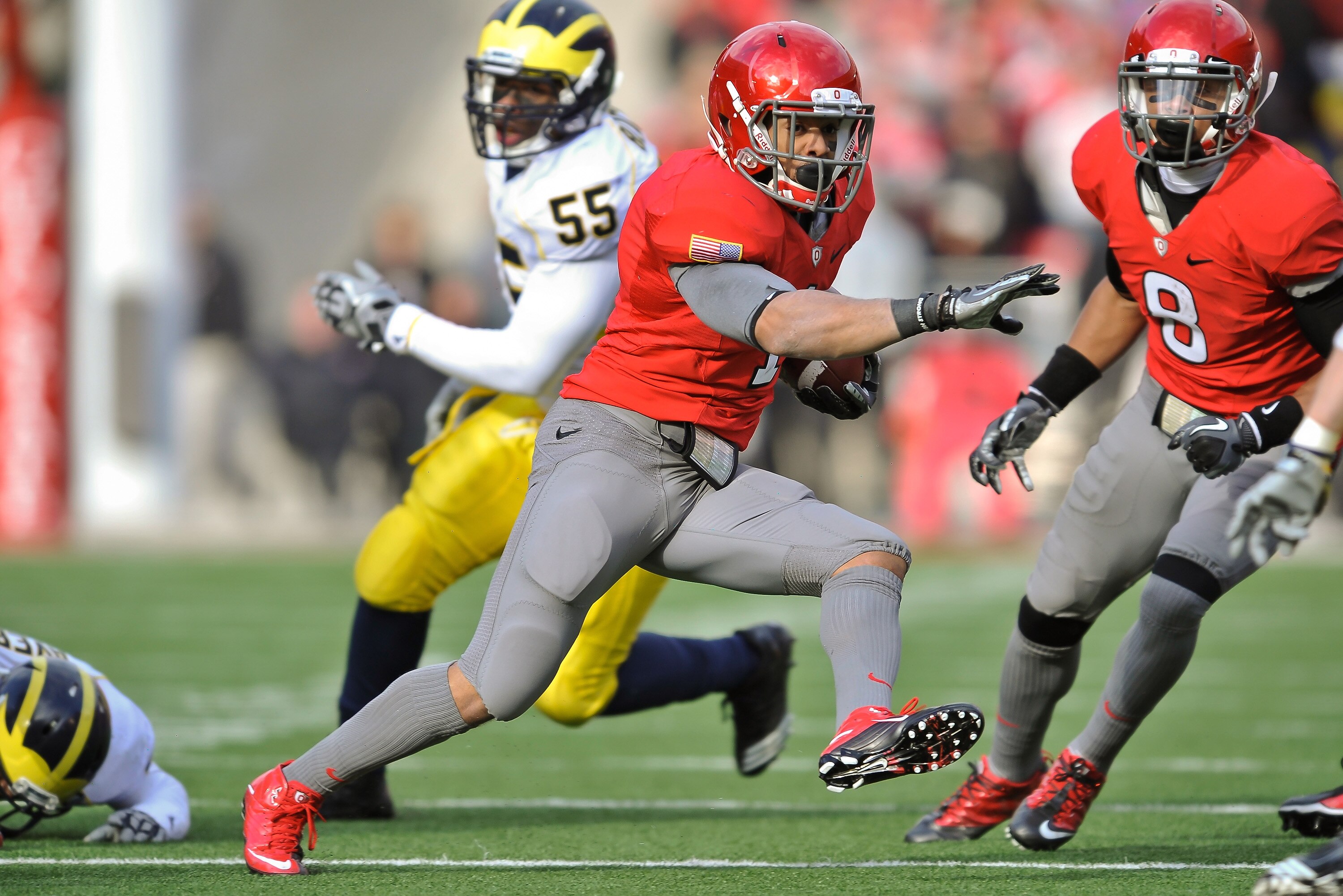 COLUMBUS, OH - NOVEMBER 27:  Dan Herron #1 of the Ohio State Buckeyes  runs with the ball against the Michigan Wolverines at Ohio Stadium on November 27, 2010 in Columbus, Ohio.  (Photo by Jamie Sabau/Getty Images)