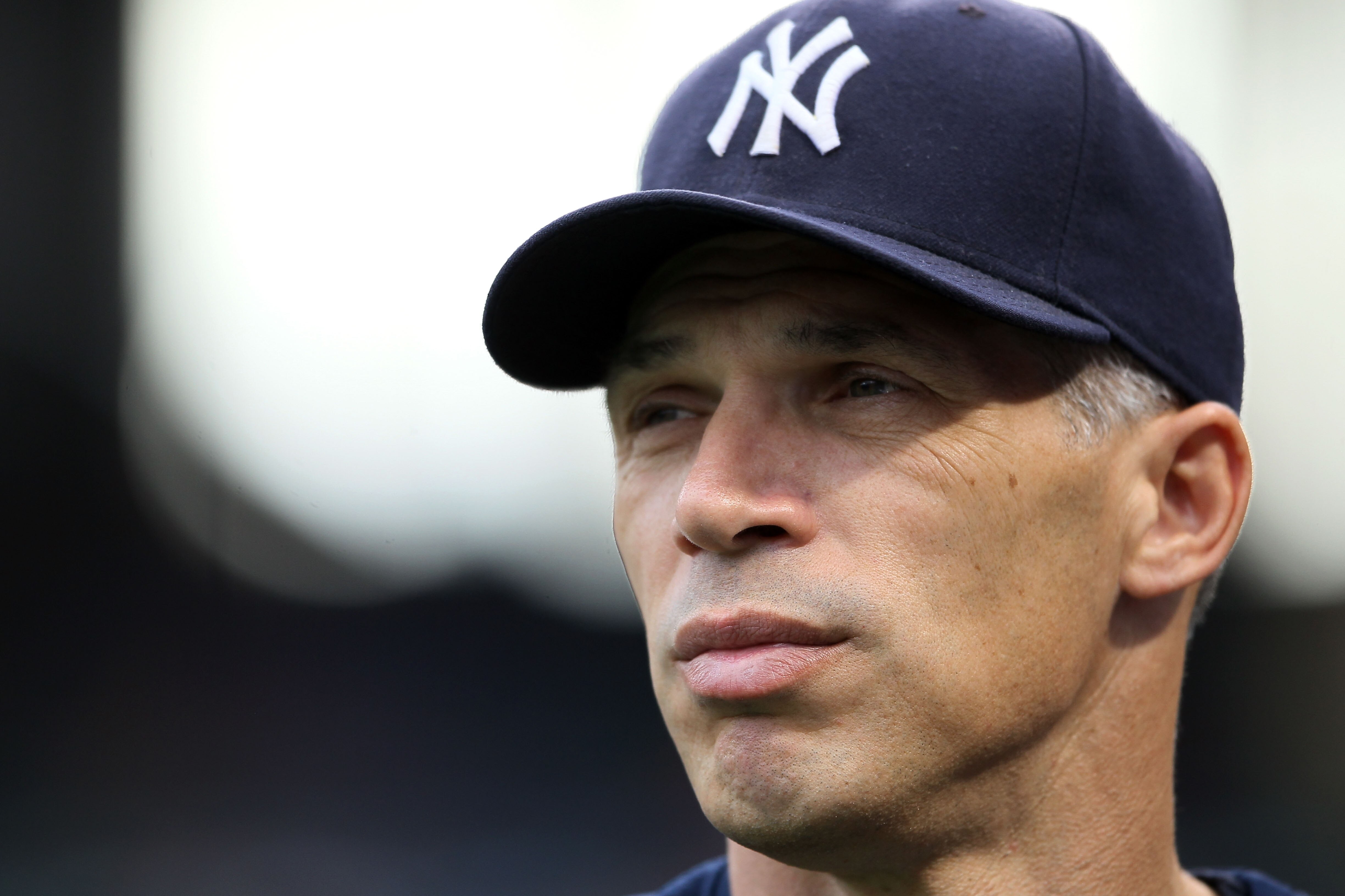 ARLINGTON, TX - OCTOBER 22:  Manager Joe Girardi of the New York Yankees looks on during batting practice prior to Game Six of the ALCS against the Texas Rangers during the 2010 MLB Playoffs at Rangers Ballpark in Arlington on October 22, 2010 in Arlingto