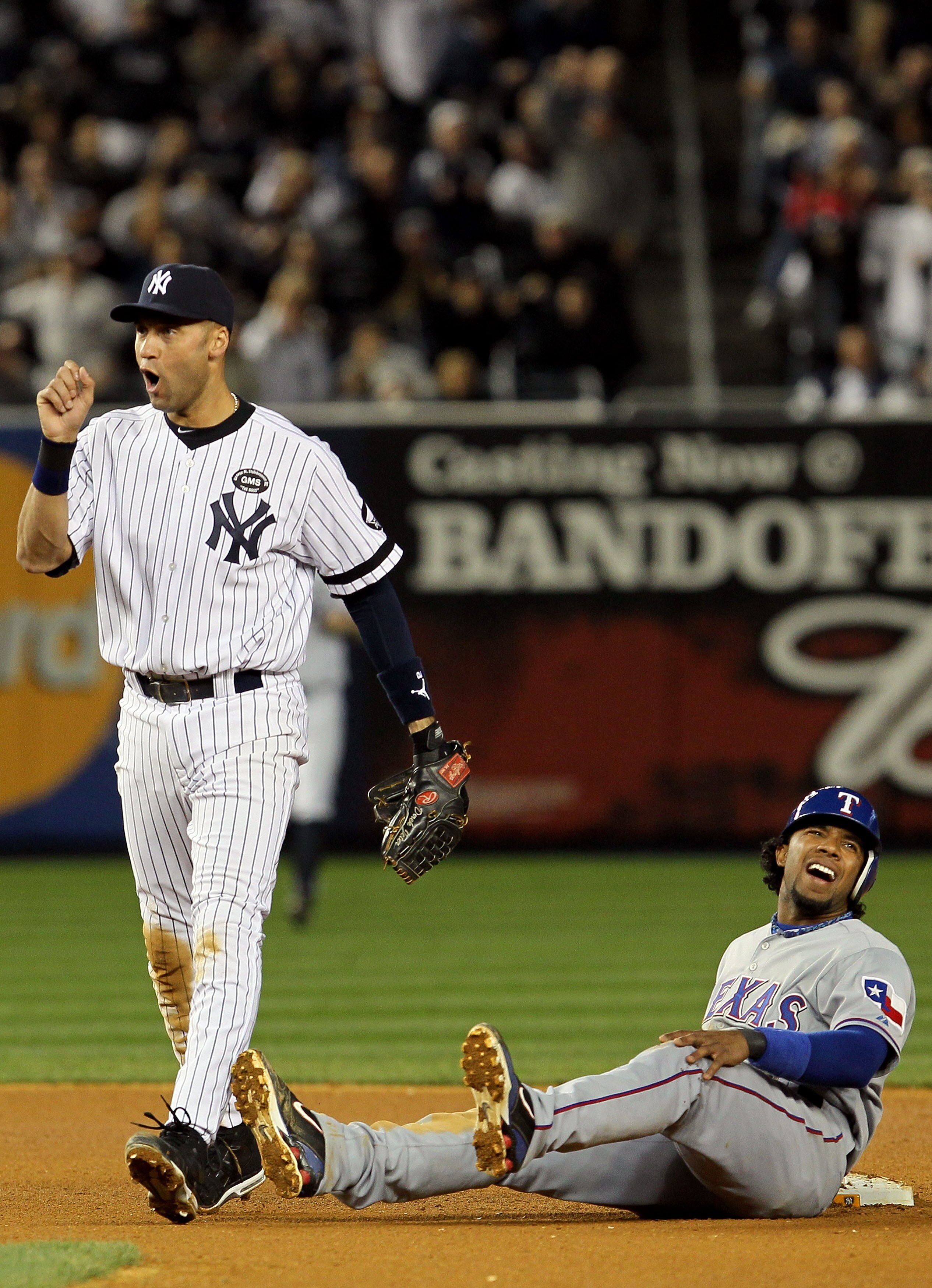 NEW YORK - OCTOBER 20:  Derek Jeter #2 of the New York Yankees reacts after he tagged out Elvis Andrus #1 of the Texas Rangers on a pickoff play at second base in the top of the seventh inninng of Game Five of the ALCS during the 2010 MLB Playoffs at Yank