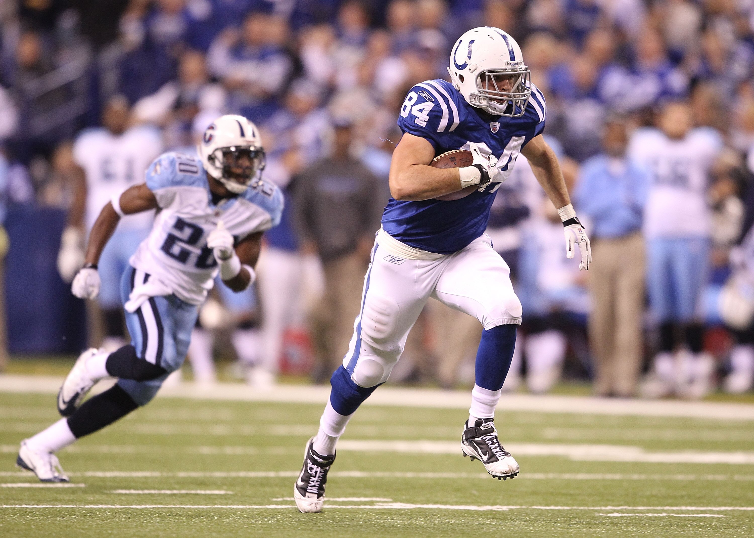 INDIANAPOLIS - JANUARY 02:  Jacob Tamme #84 of the Indianapolis Colts runs with the ball during NFL game against the Tennessee Titans at Lucas Oil Stadium on January 2, 2011 in Indianapolis, Indiana.  (Photo by Andy Lyons/Getty Images)