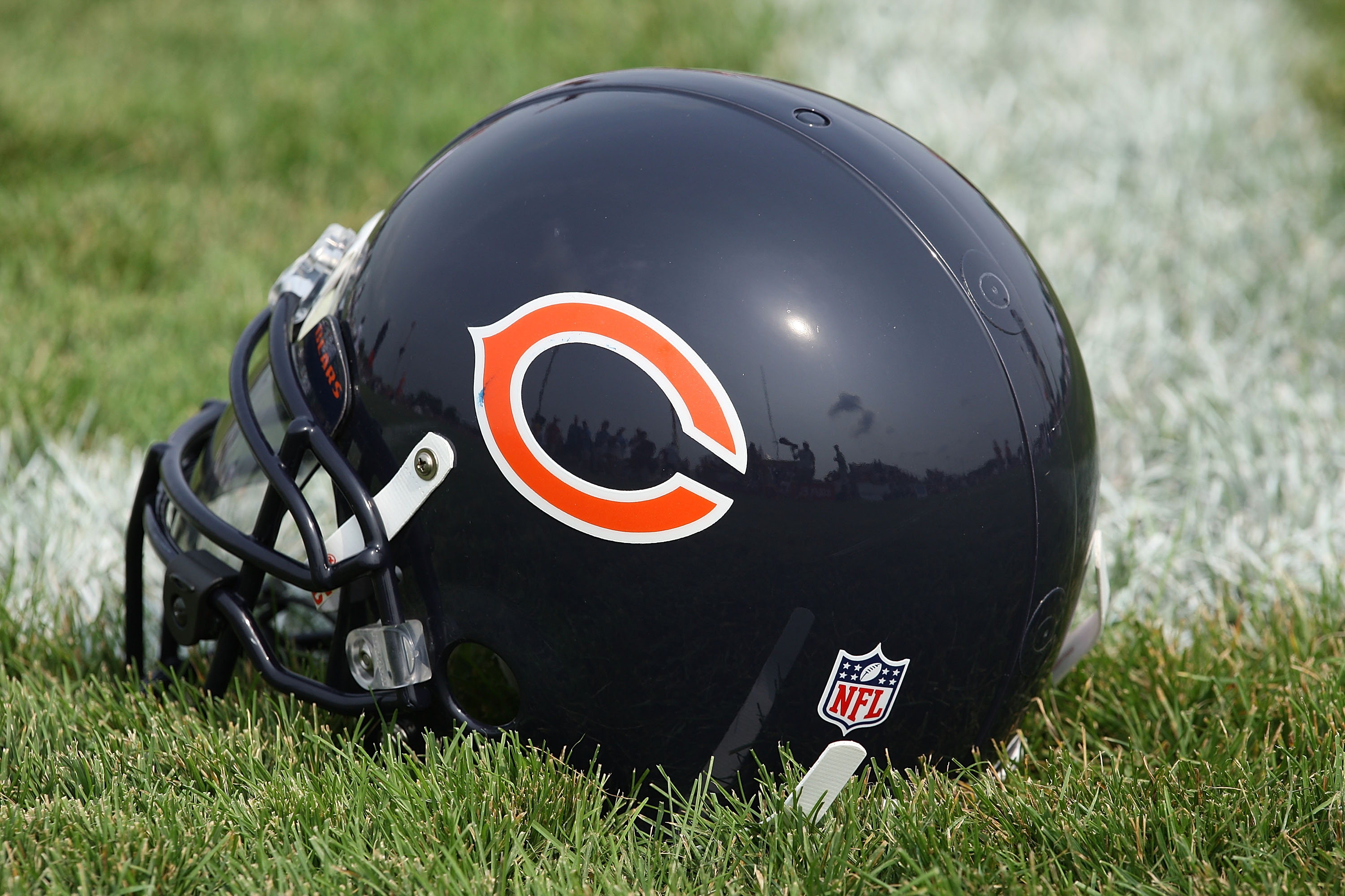 BOURBONNAIS, IL - AUGUST 4: A Chicago Bears helmet rests on the field during a training camp practice at Olivet Nazarene University August 4, 2009 in Bourbonnais, Illinois. (Photo by Jonathan Daniel/Getty Images)