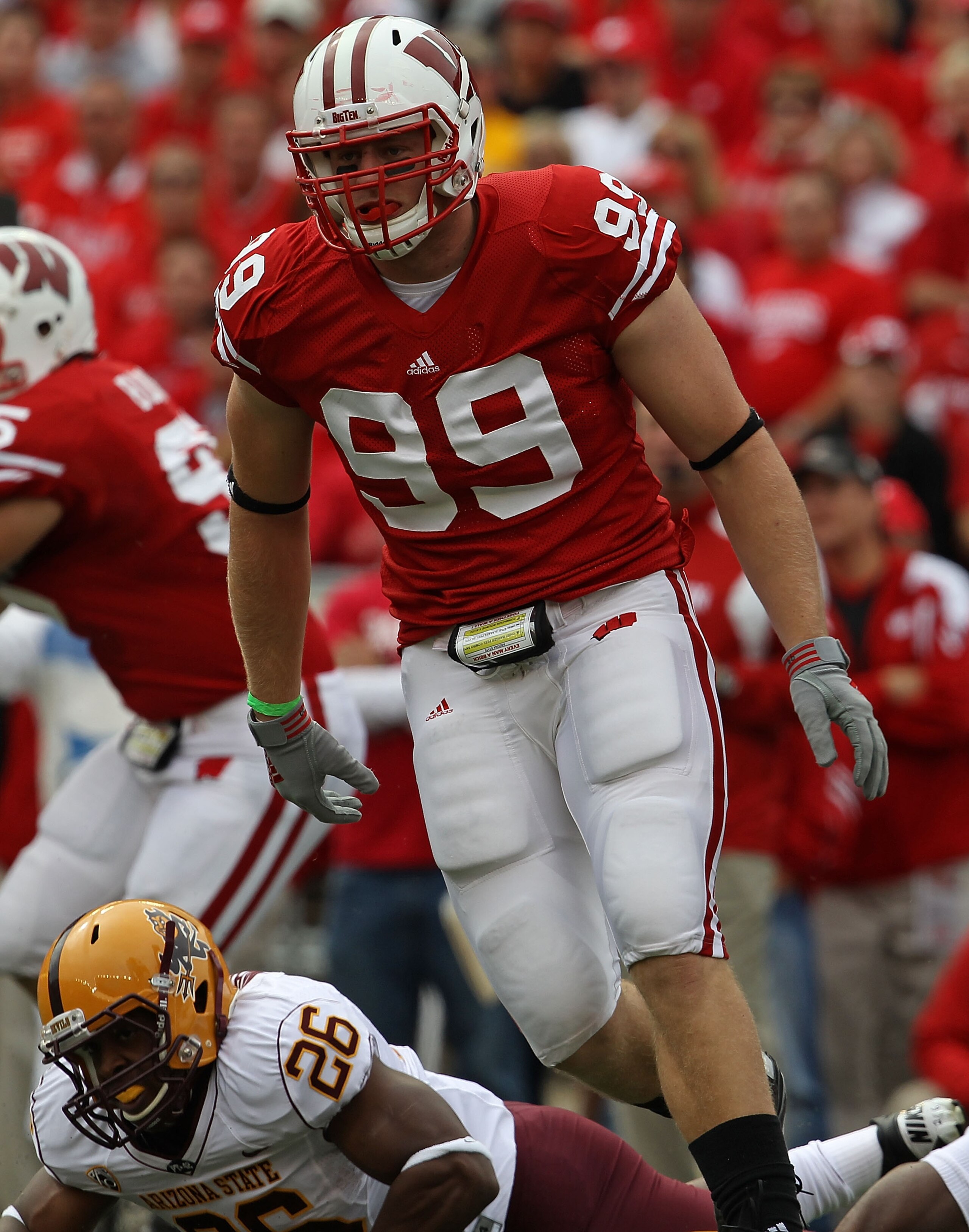 MADISON, WI - SEPTEMBER 18: J.J. Watt #99 of the Wisconsin Badgers rushes against the Arizona State Sun Devils at Camp Randall Stadium on September 18, 2010 in Madison, Wisconsin. Wisconsin defeated Arizona State 20-19. (Photo by Jonathan Daniel/Getty Ima