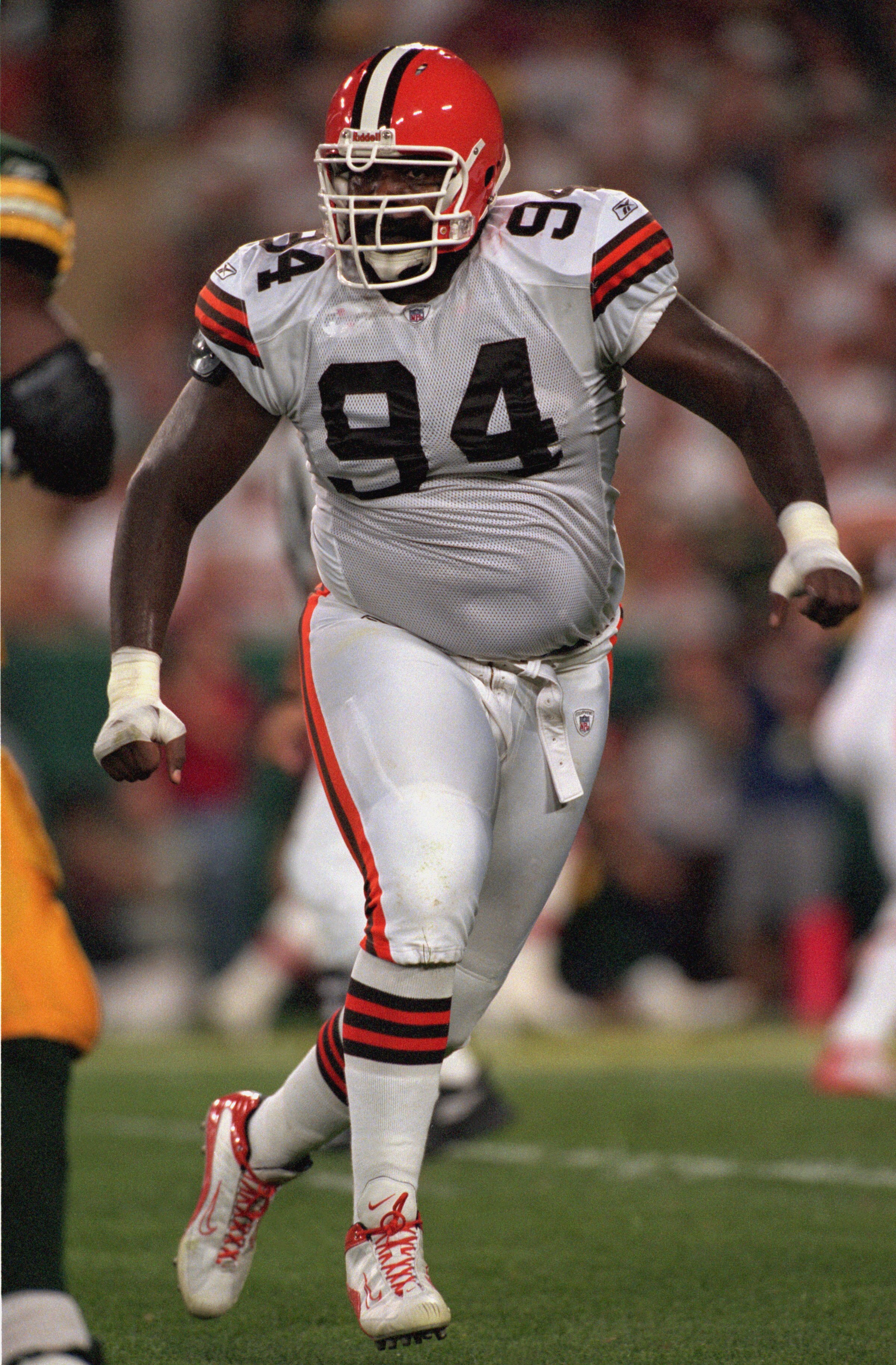 GREEN BAY, WI- AUGUST 26:  Gerrard Warren #94 of the  Cleveland Browns moves on the field during the game against the Green Bay Packers at Lambeau Field on August 26,2002 in Green Bay, Wisconsin. The Packer won 27-20. ( Photo by: Jonathan Daniel/Getty Ima