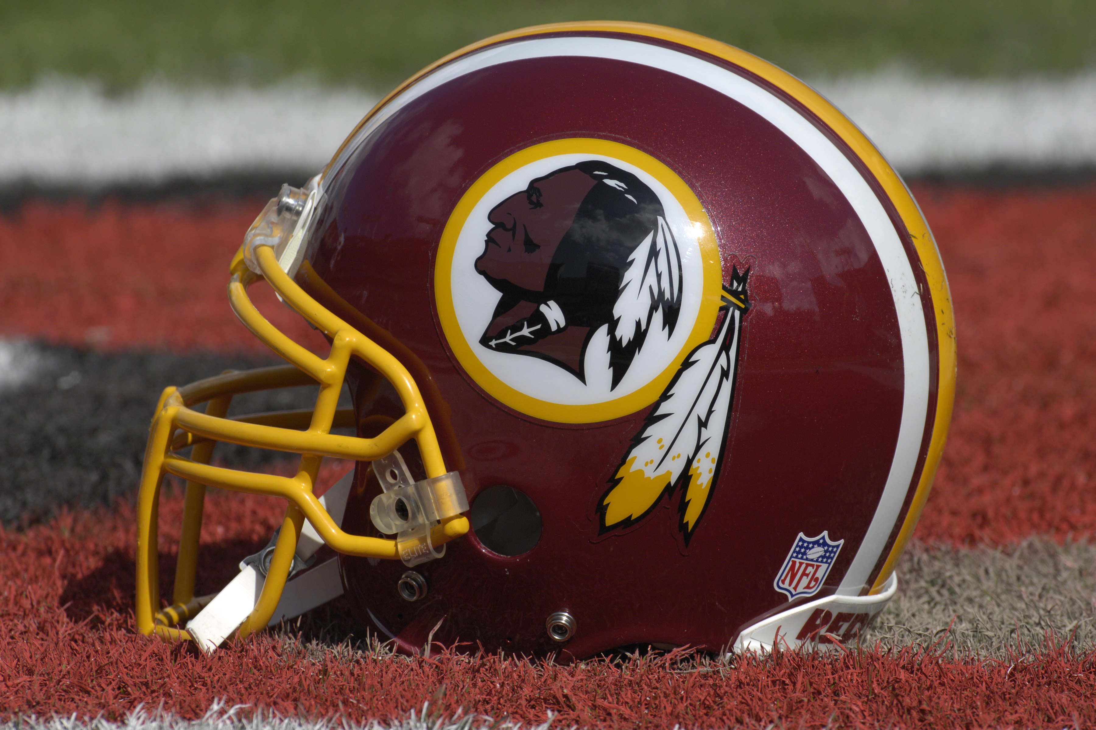 TAMPA, FL - NOVEMBER 25: The helmet of a Washington Redskins player rests on the field during warm ups against the Tampa Bay Buccaneers at the Raymond James Stadium on November 25, 2007 in Tampa, Florida.  The Bucs won 19-13. (Photo by Al Messerschmidt/Ge