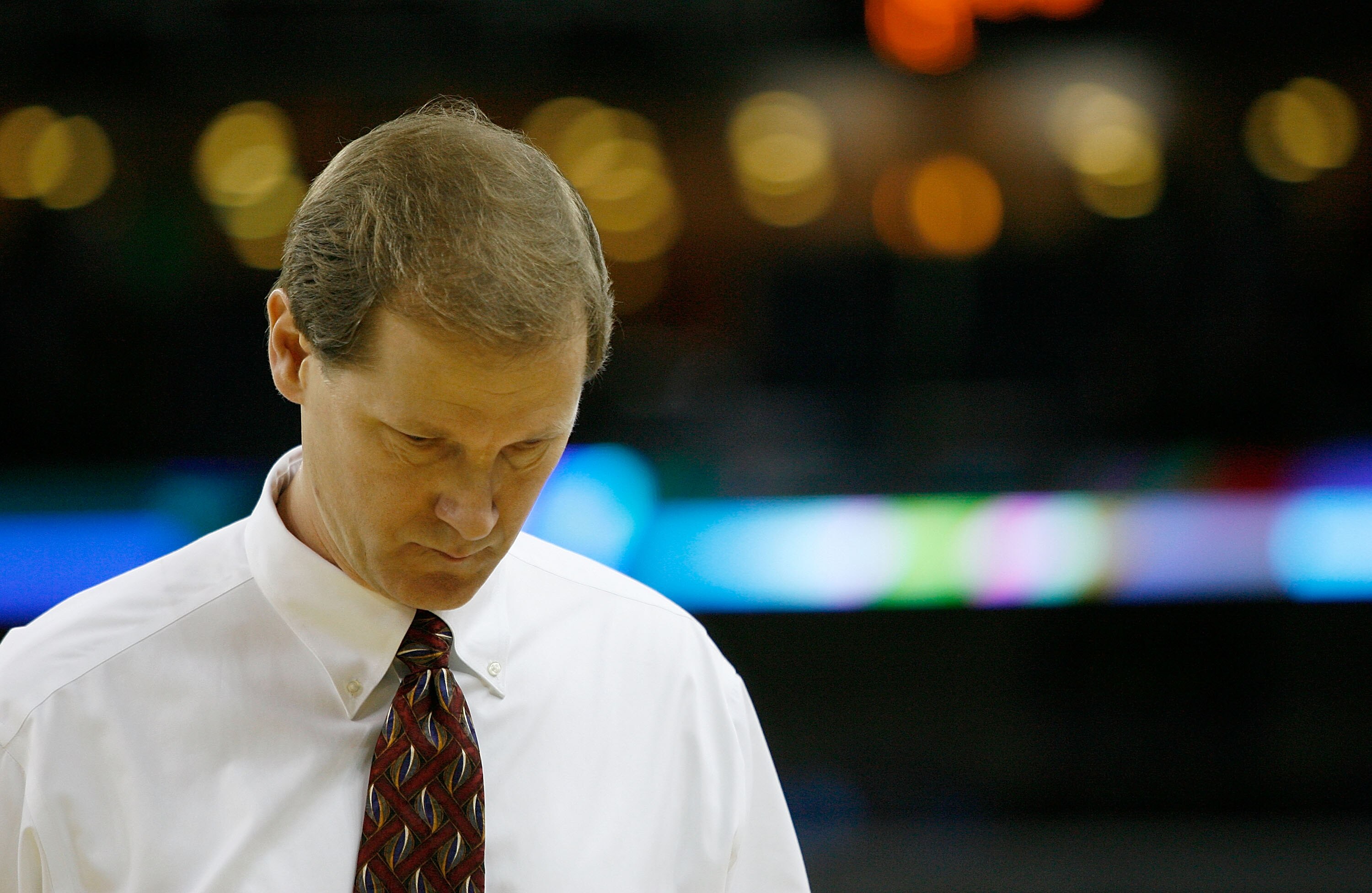 NEW ORLEANS - MARCH 16:  Head coach Dana Altman of the Creighton Bluejays walks off the court after being knocked out of round one of the NCAA Men's Basketball Tournament 77-71 by the Nevada Wolf Pack at the New Orleans Arena on March 16, 2007 in New Orle