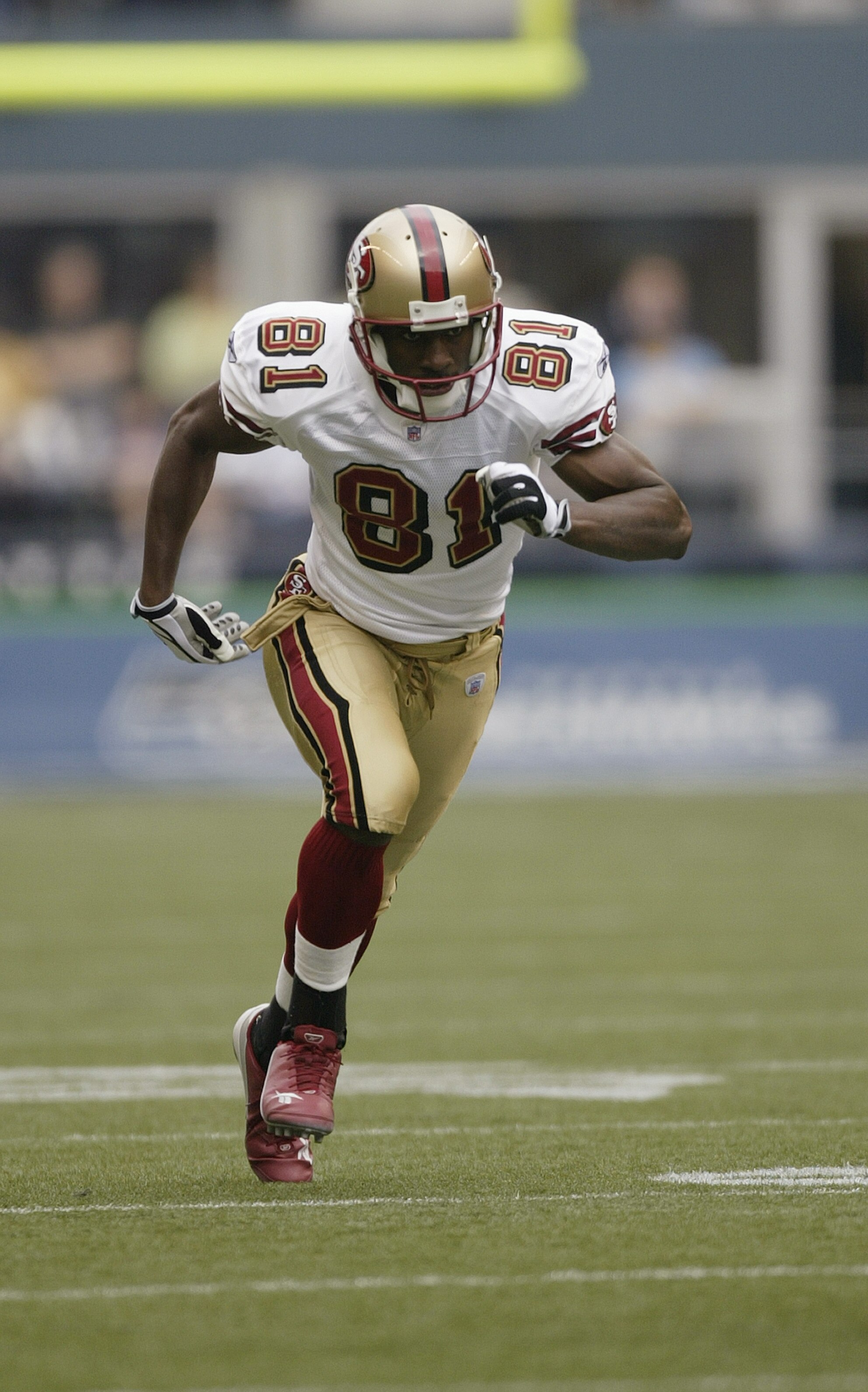 SEATTLE - SEPTEMBER 26:  Wide reciever Rashaun Woods #81 of the San Francisco 49ers runs on the field during the game with the Seattle Seahawks at Qwest Field on September 26, 2004 in Seattle, Washington. The Seahawks won 34-0. (Photo by Otto Greule Jr/Ge