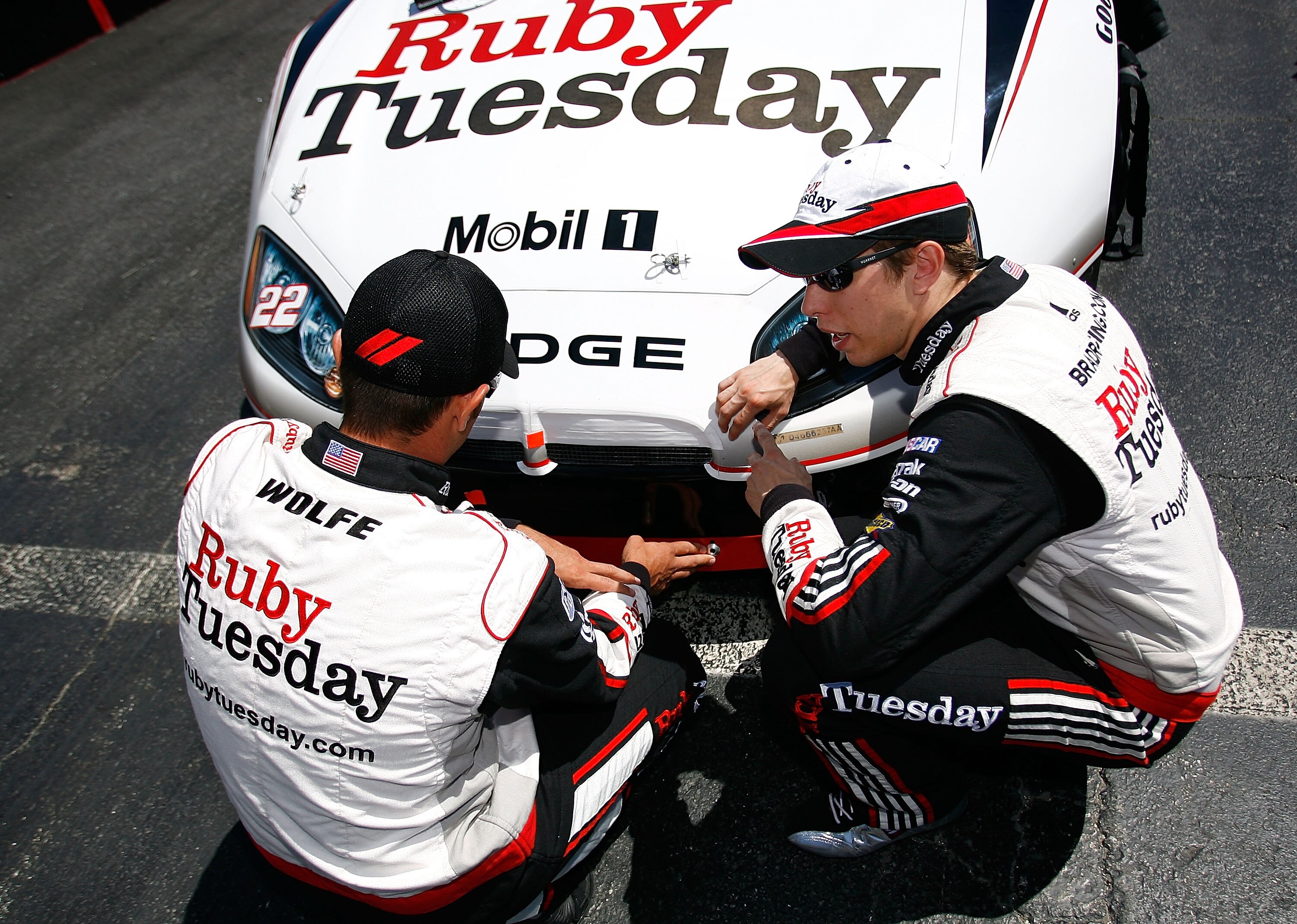 DOVER, DE - MAY 15: Brad Keselowski (R), driver of the #22 Ruby Tuesday Dodge, talks with his crew chief Paul Wolfe on the grid prior to the start of NASCAR Nationwide Series Heluva Good! 200 at Dover International Speedway on May 15, 2010 in Dover, Delaw