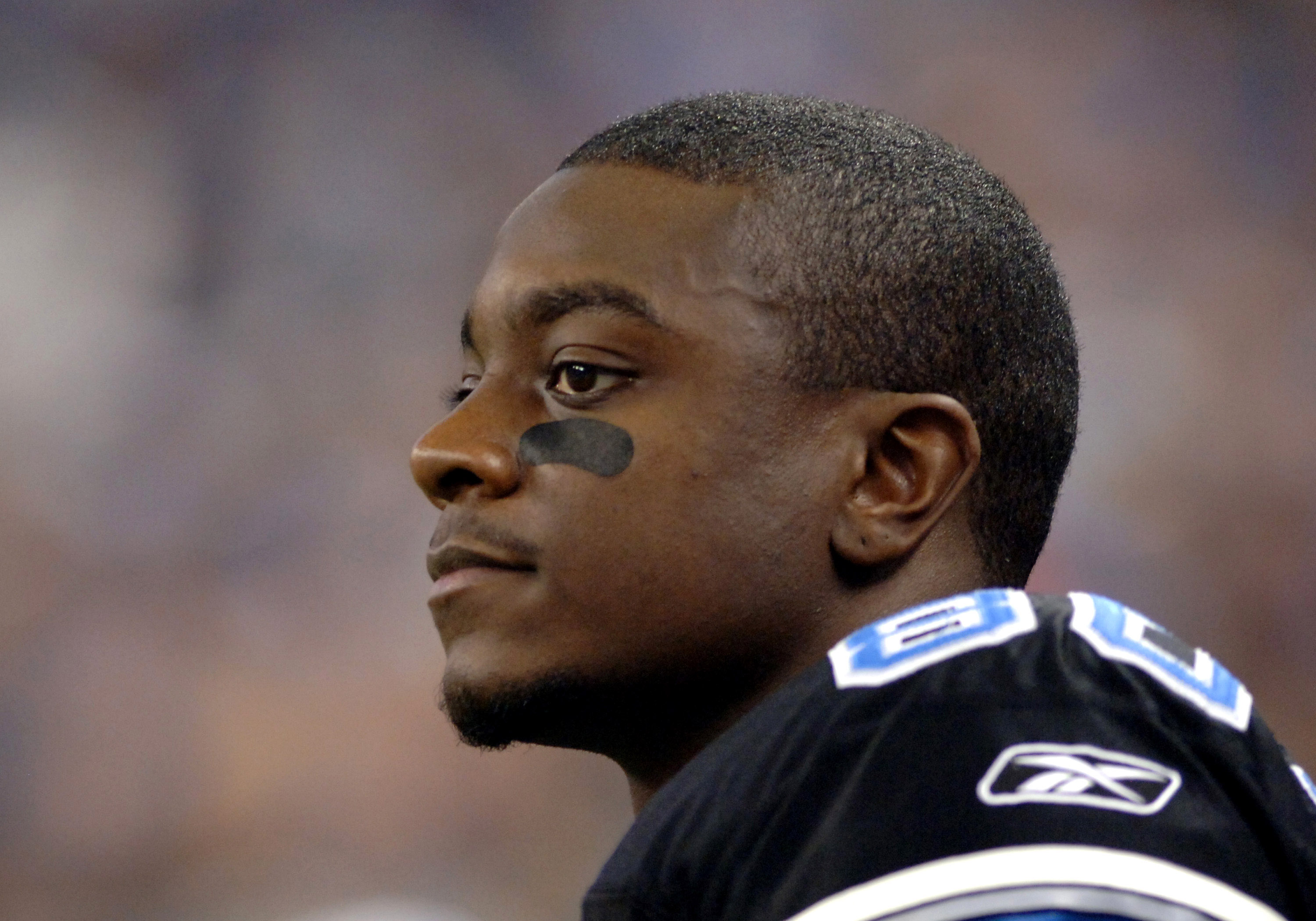 Detroit Lions wide receiver Charles Rogers watches play during  a Thanksgiving Day game, November 24, 2005, at Ford Field, Detroit.  The Atlanta Falcons defeated the Lions 27 - 7. (Photo by Al Messerschmidt/Getty Images)