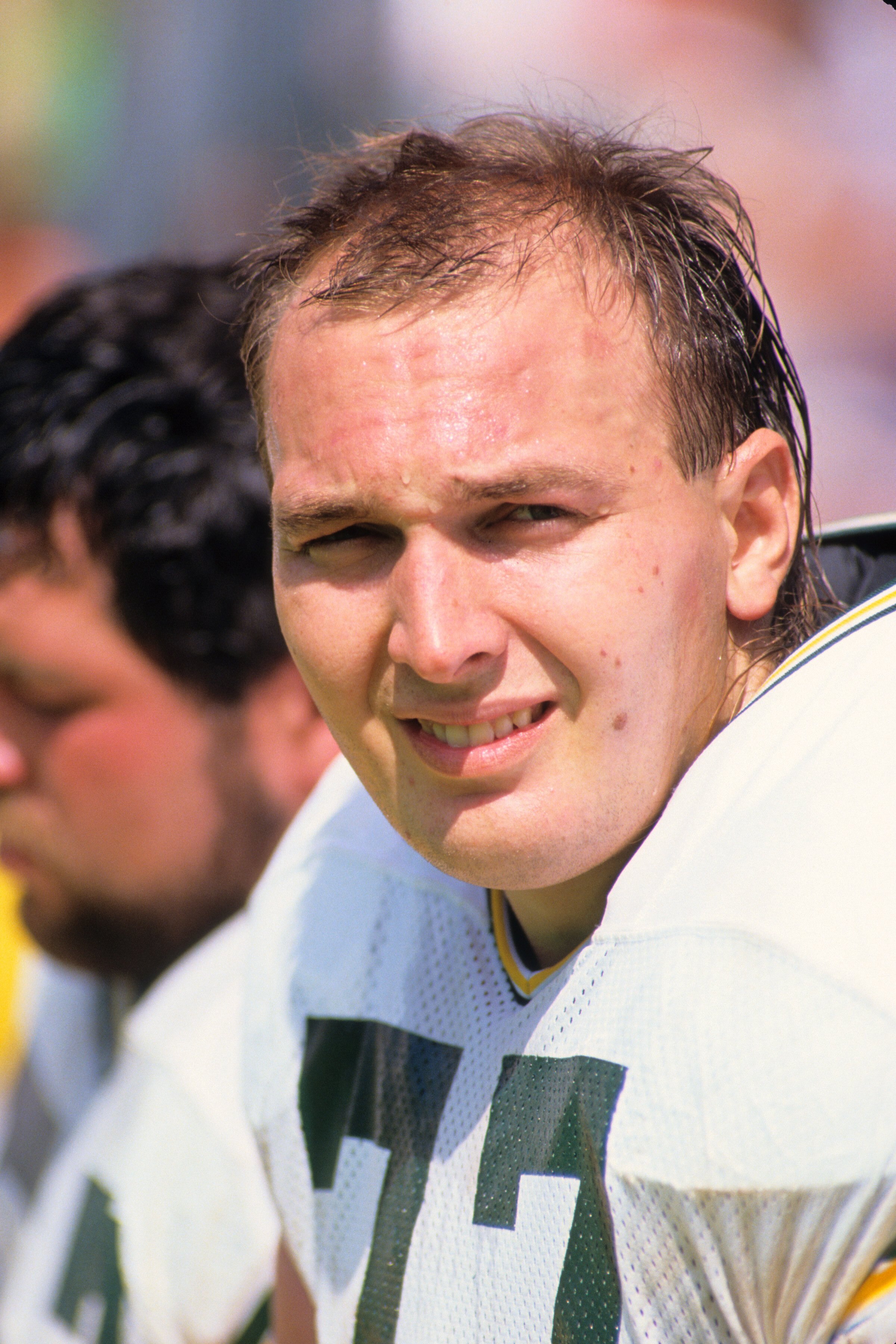 ANAHEIM, CA - SEPTEMBER 24:  Tony Mandarich #77 of the Green Bay Packers looks on during the game against the Los Angeles Rams at Anaheim Stadium on September 24, 1989 in Anaheim, California.  The Rams won 41-38.  (Photo by George Rose/Getty Images)
