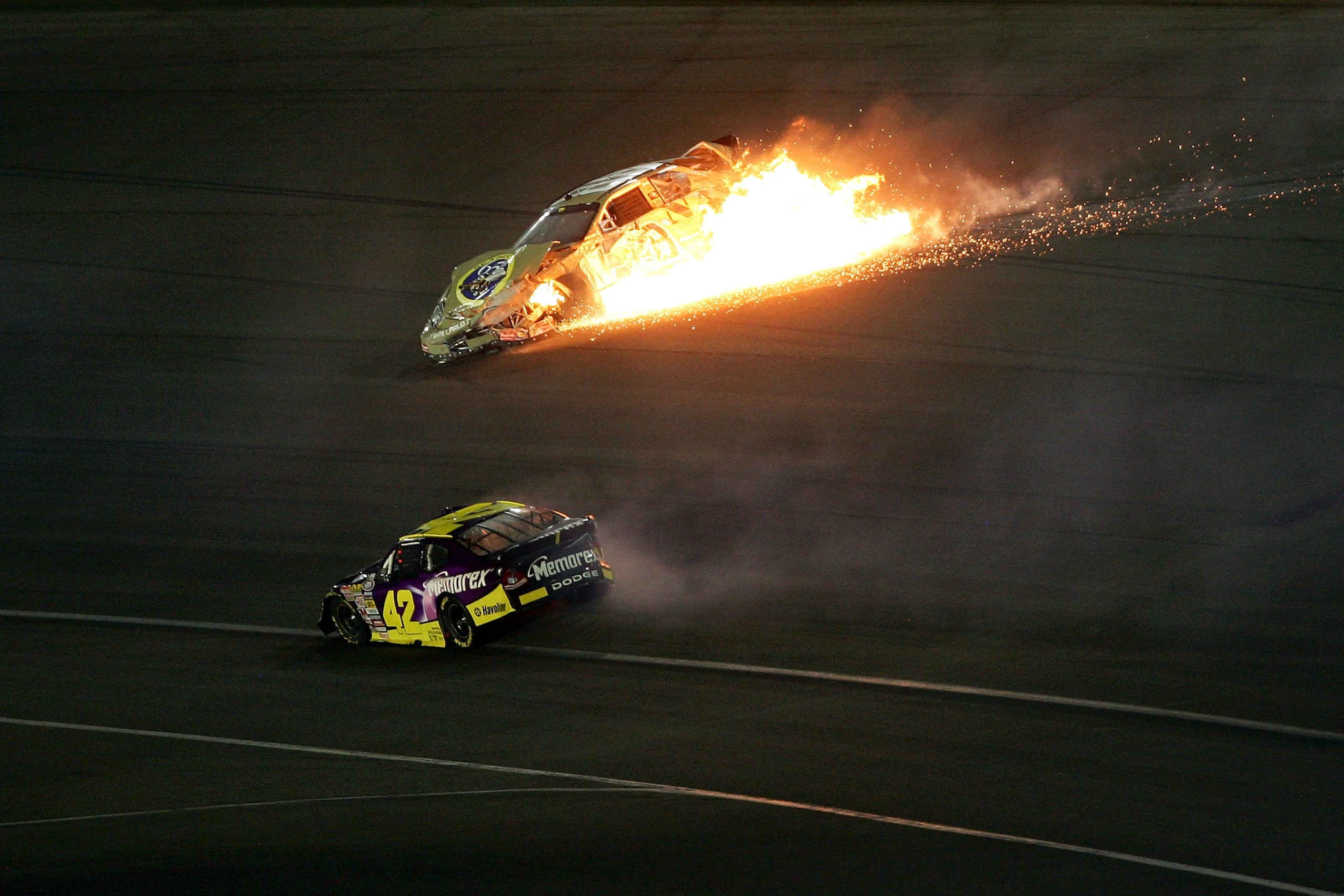 FONTANA, CA - SEPTEMBER 01:  Brad Keselowski, driver of the #88 U.S. NAVY Seals Chevrolet, car catches fire after being run into the wall during the NASCAR Busch Series Camping World 300 at California Speedway on September 1, 2007 in Fontana, California.